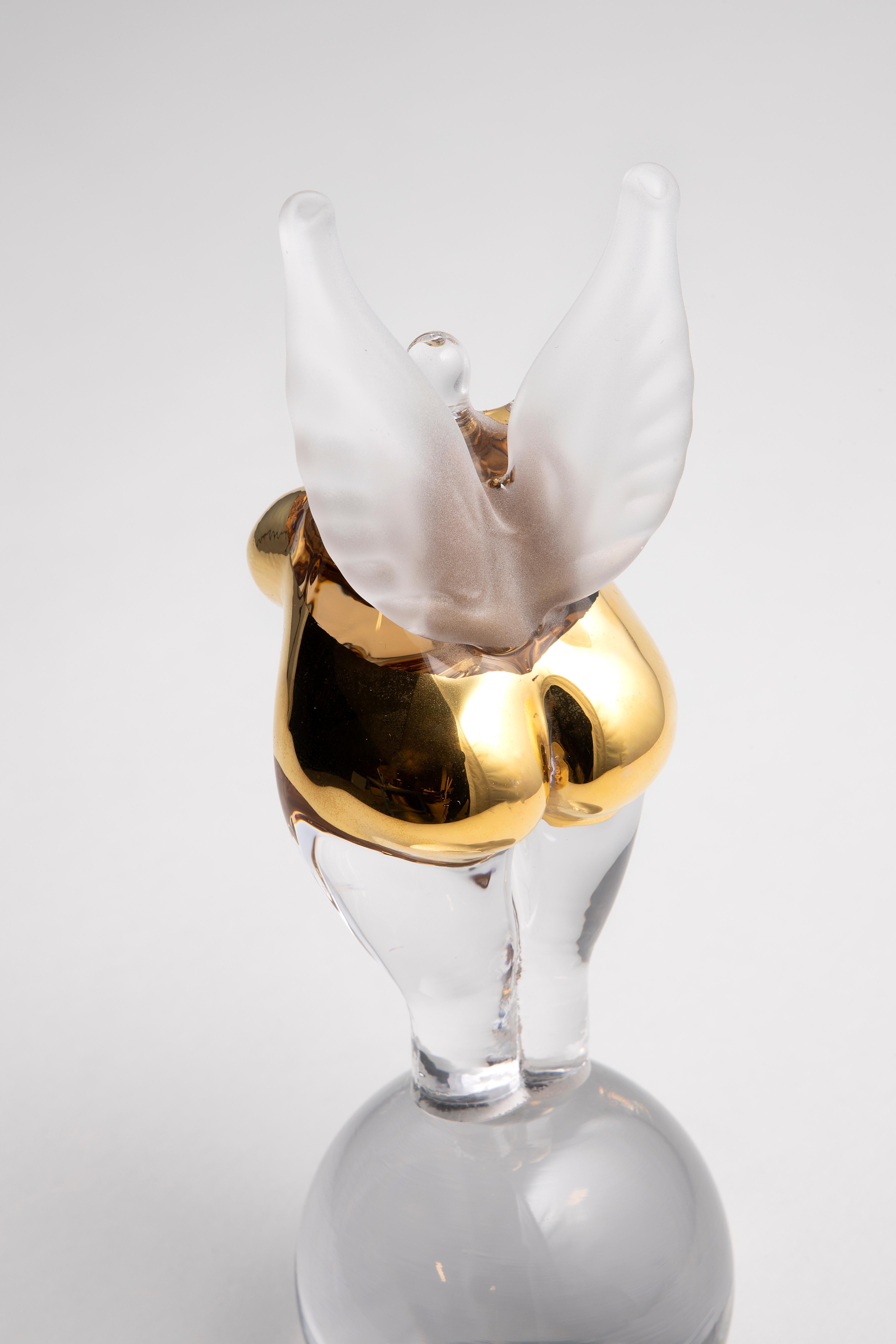 Golden Angel by Kjell Engman is inspired by the artist's own bathing ladies, whose shape is influenced by the curvaceous gospel singers he saw performing during a visit to the US. The object from Kosta Boda Artist Collection is handmade at Kosta