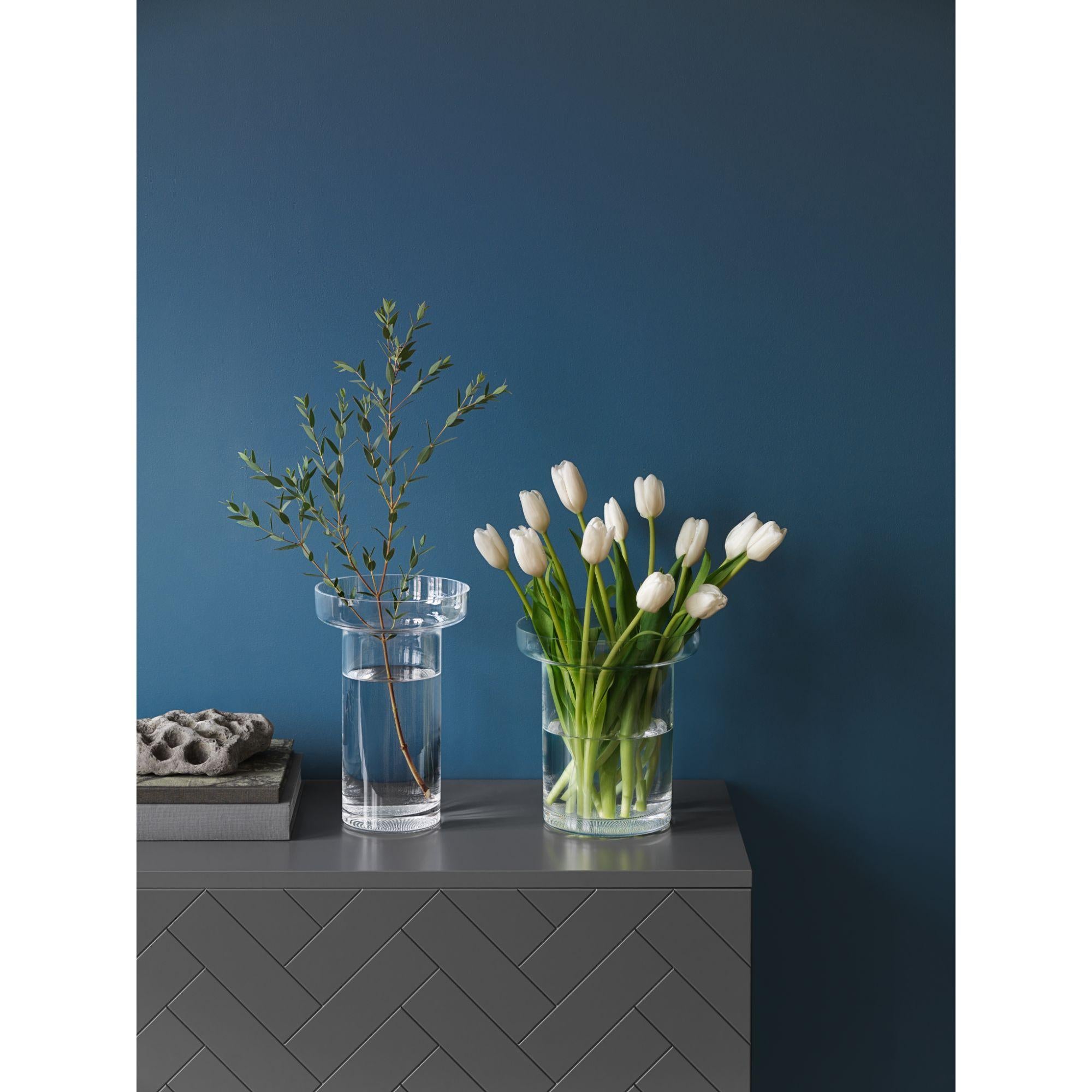 The low Limelight vase has a collar that perfectly frames and highlights any bouquet, and the shape of the vase makes it ideal for top-heavy flowers. Like all the items in the Limelight collection from Kosta Boda, this vase has the distinctive,