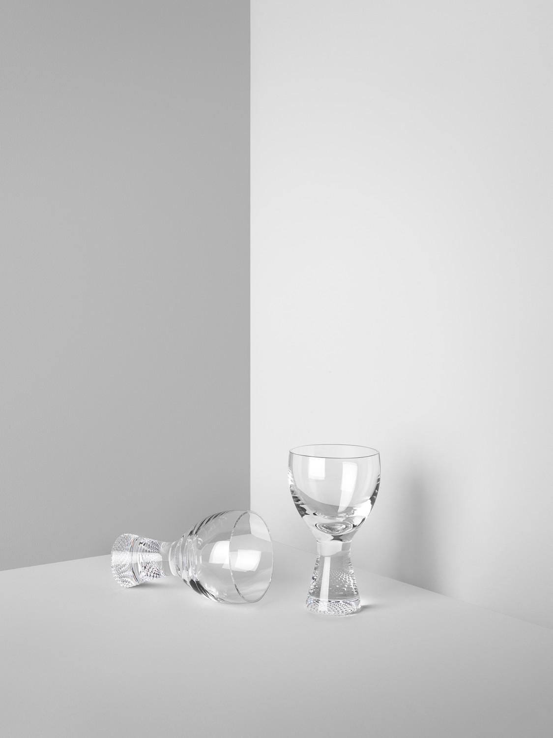 Like all the items in the Limelight collection, this glass has the distinctive, textured base that optically reflects light. The small wine glass is great for white wines, and it's even handmade. All the pieces in the collection from Kosta Boda are