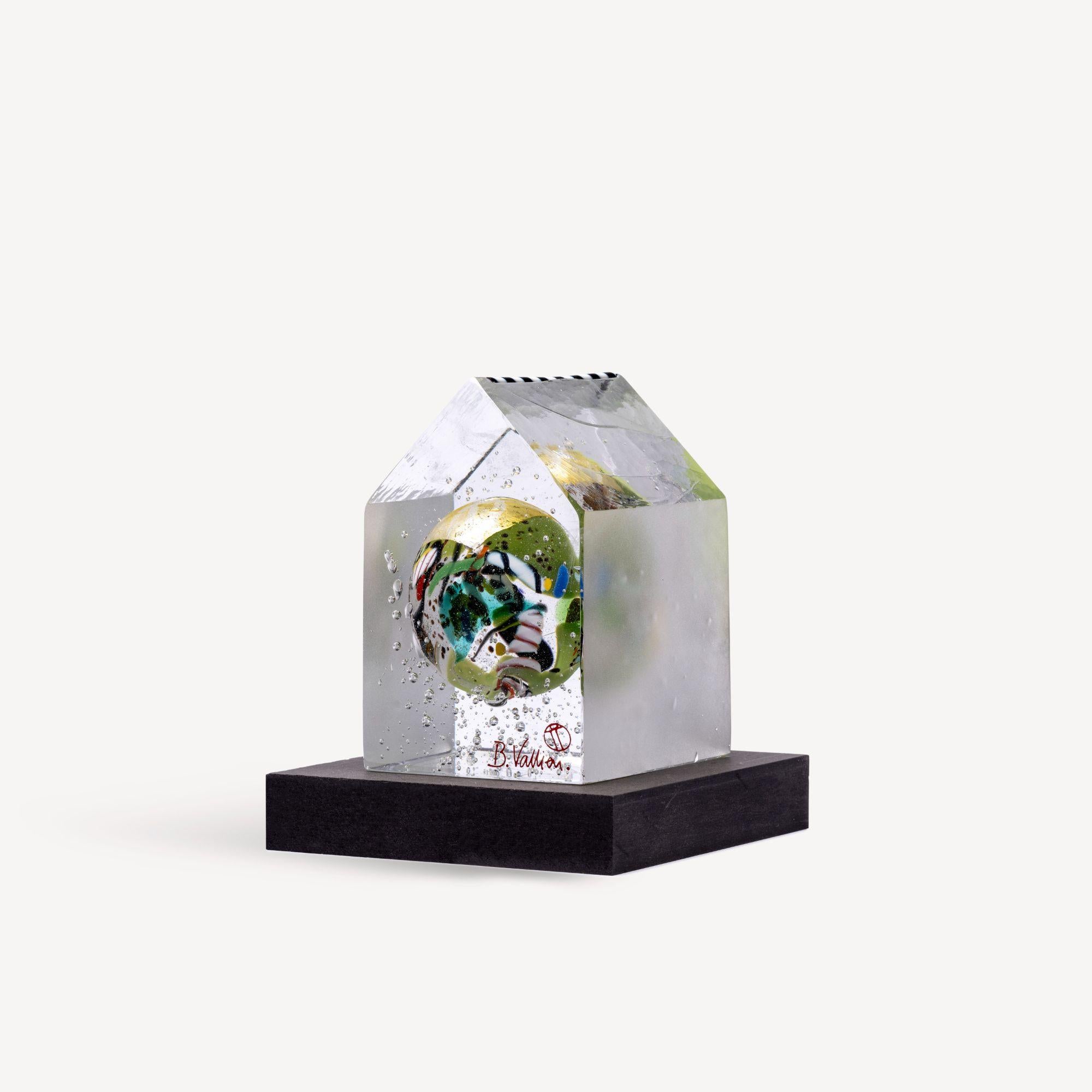 My Palace Globe is a collection of exquisite “globes” enclosed by a transparent house. These hand-made globes shift in color and style, similar to the ocean exposed to a change in light. As a result, this sculpture comes to life, reminiscent of
