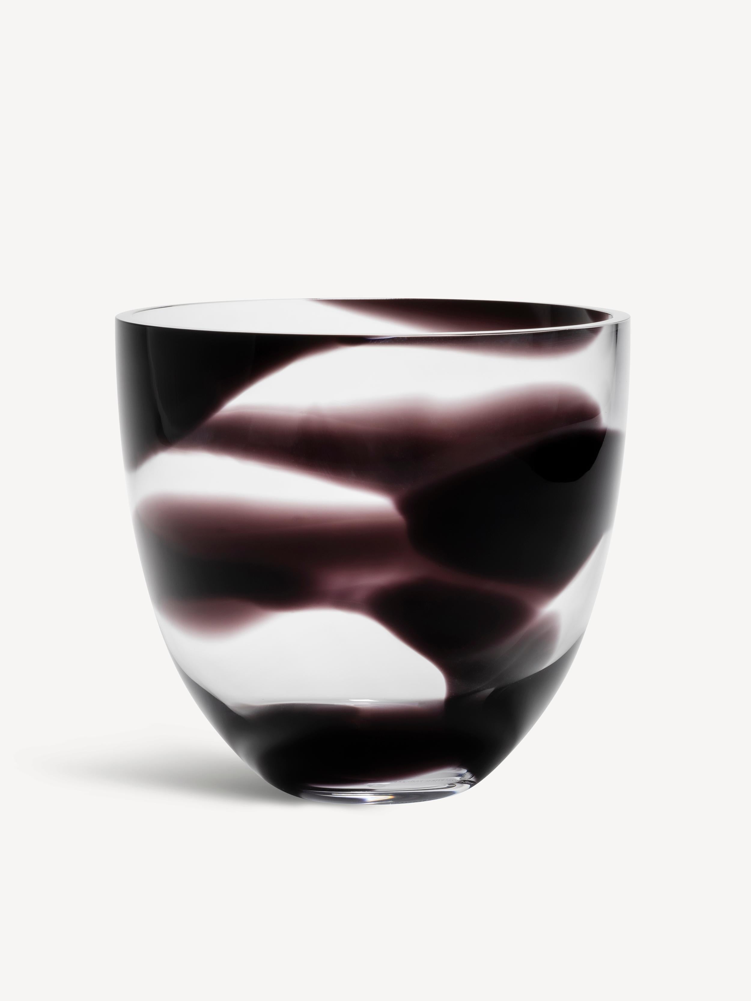 The Non Stop bowl has a wrap-around black pattern that results in a graphic, vibrant finish. Let’s not ever stop loving great design. The bowl is mouth-blown at Kosta Glassworks in Sweden. Design by Anna Ehrner. 
