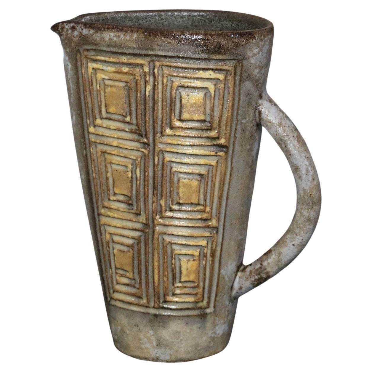 Kostanda - French Ceramic Pitcher, circa 1970s, Vallauris era Derval, Capron

It is in a perfect condition. Please be sure to look at the pictures, they complete the description of the piece.
The pitcher is signed under the base.

Alexandre