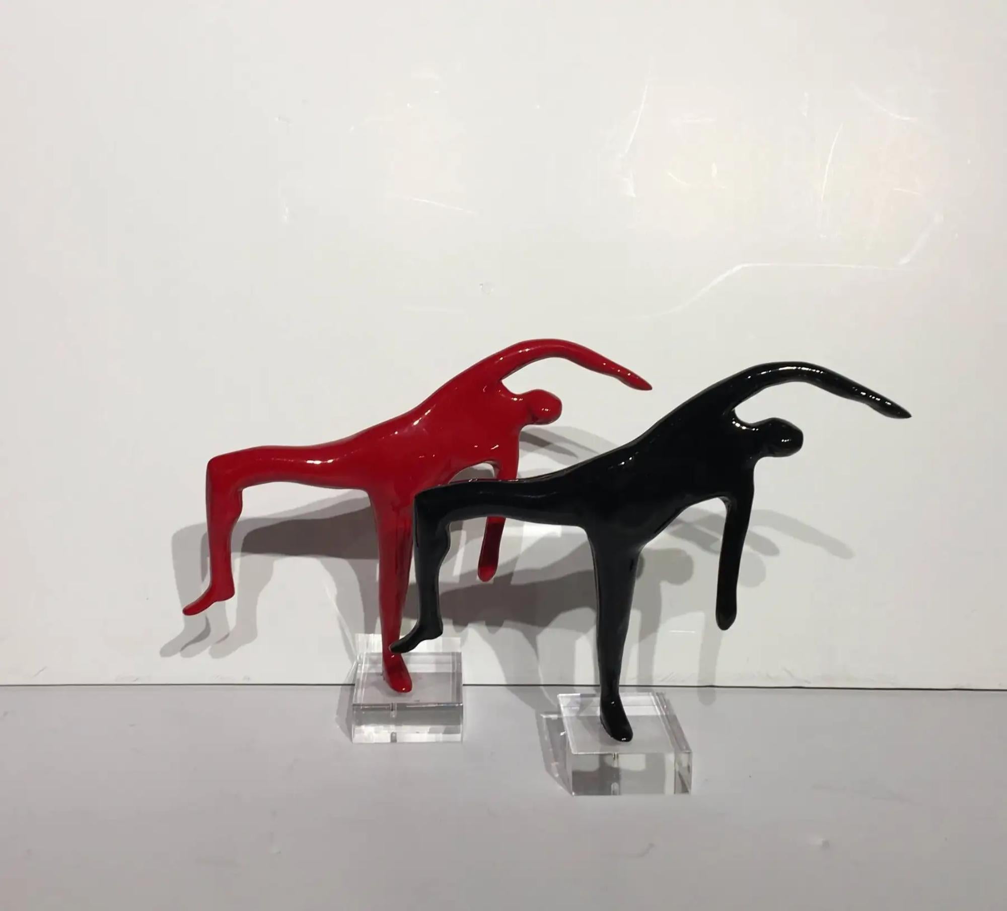 Thesis

Bronze sculpture with painted patina 
Available in Red &amp; Black

Dimensions: 7 x 9.5 x 2 in (18 x 24 x 5 cm)

Available for purchase individually or as a pair.

Born in Thessaloniki, Greece, Kostis Georgiou studied stage scenery in