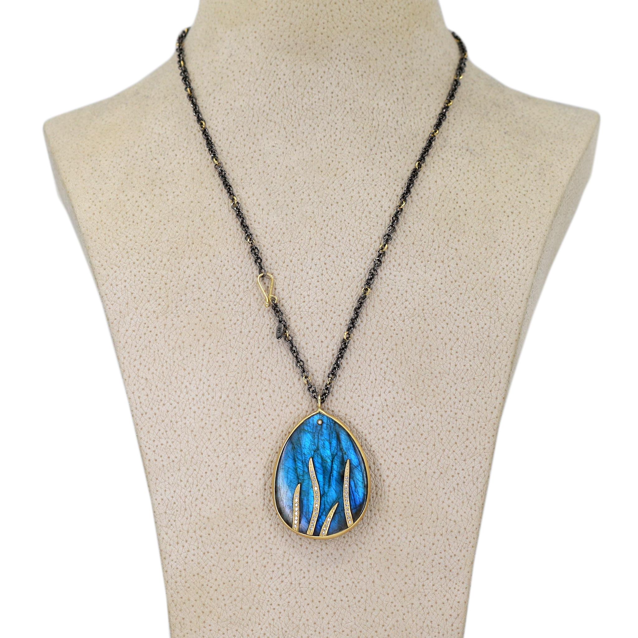 One of a Kind Necklace handcrafted by acclaimed jewelry maker Tej Kothari featuring a spectacular 39mm x 30mm labradorite tear drop cabochon, bezel-set in matte-finished 18k yellow gold, and inlaid with four 18k yellow gold brilliant-cut white