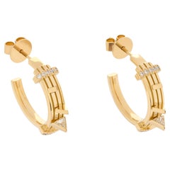 Koto Creolen aus 18 Karat Gold mit Diamanten