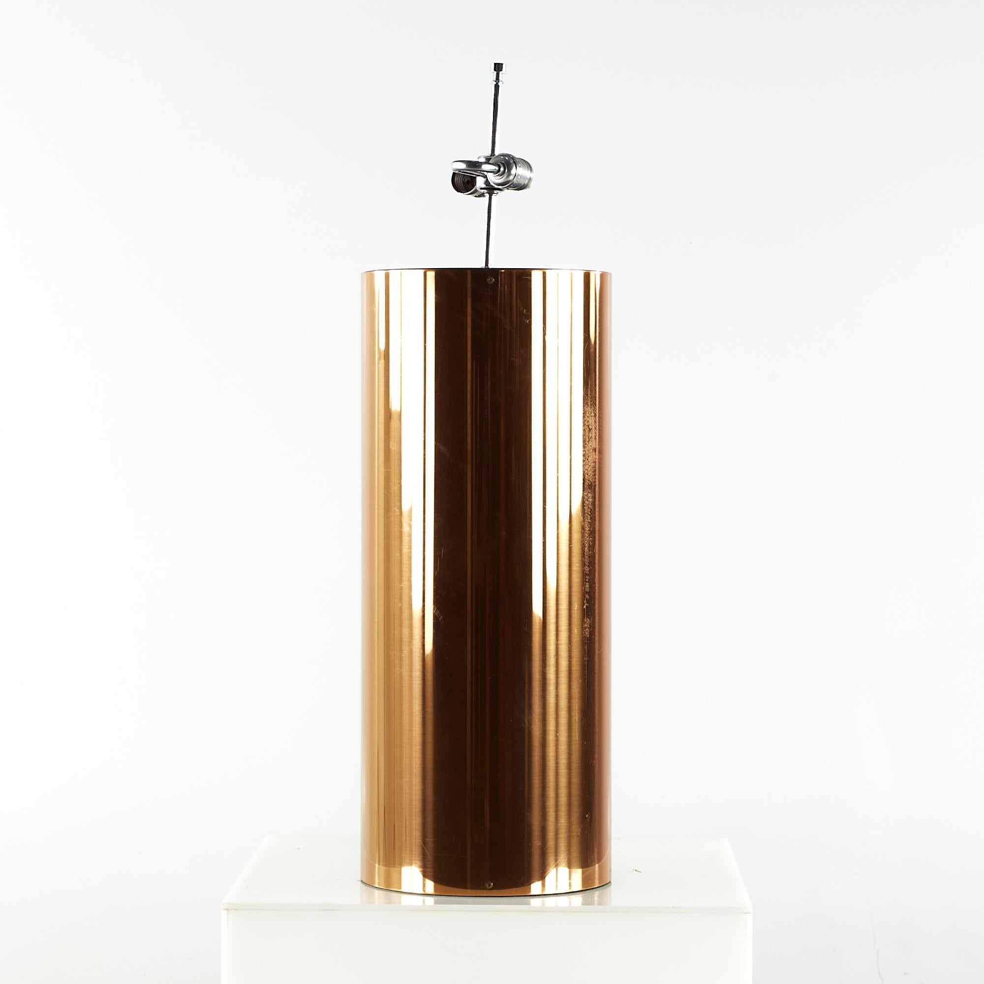 Kovacs midcentury Copper Large Table Lamp

This lamp measures: 10 wide x 10 deep x 32.5 inches high

We take our photos in a controlled lighting studio to show as much detail as possible. We do not photoshop out blemishes. 

We keep you fully