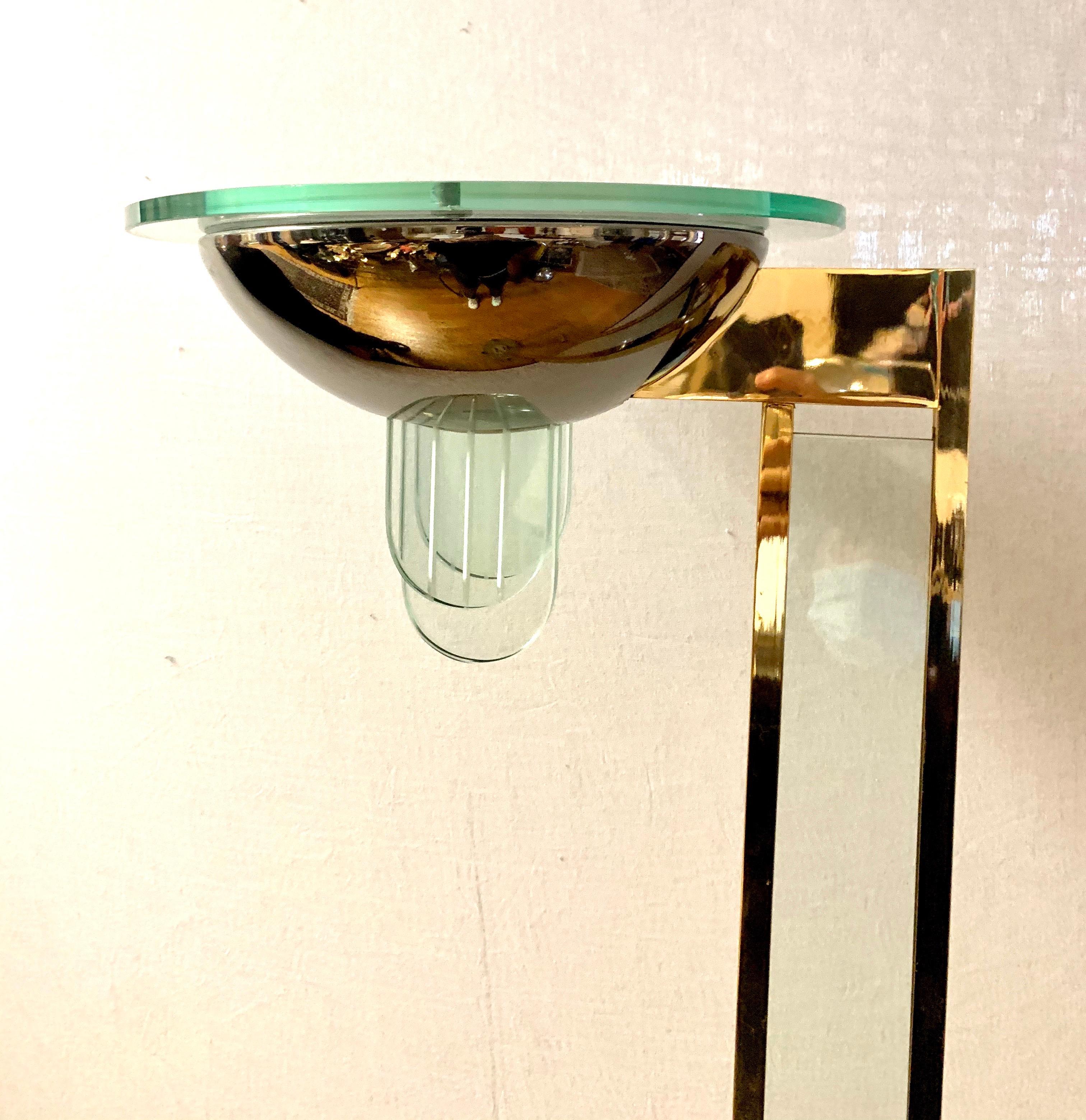 Tall midcentury Kovacs lighting Saturn brass and glass floor lamp designed by Robert Sonneman.
This floor lamp looks like a work of art and has a dimmer control on bottom than
controls lighting volume. Wired for US and in working order.