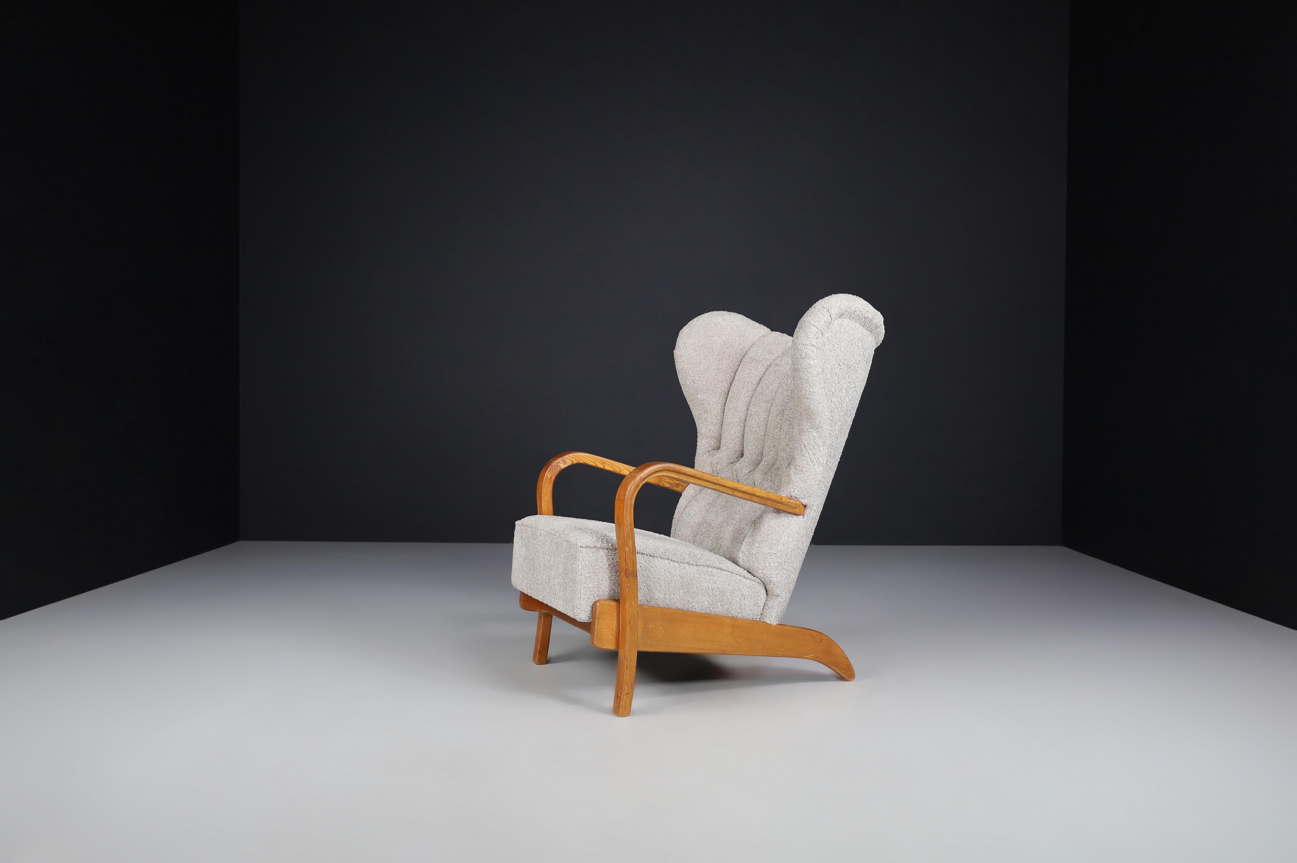 Mid-Century Modern Koželka and Kropáček Wingback Armchair Czechia, 1940s For Sale