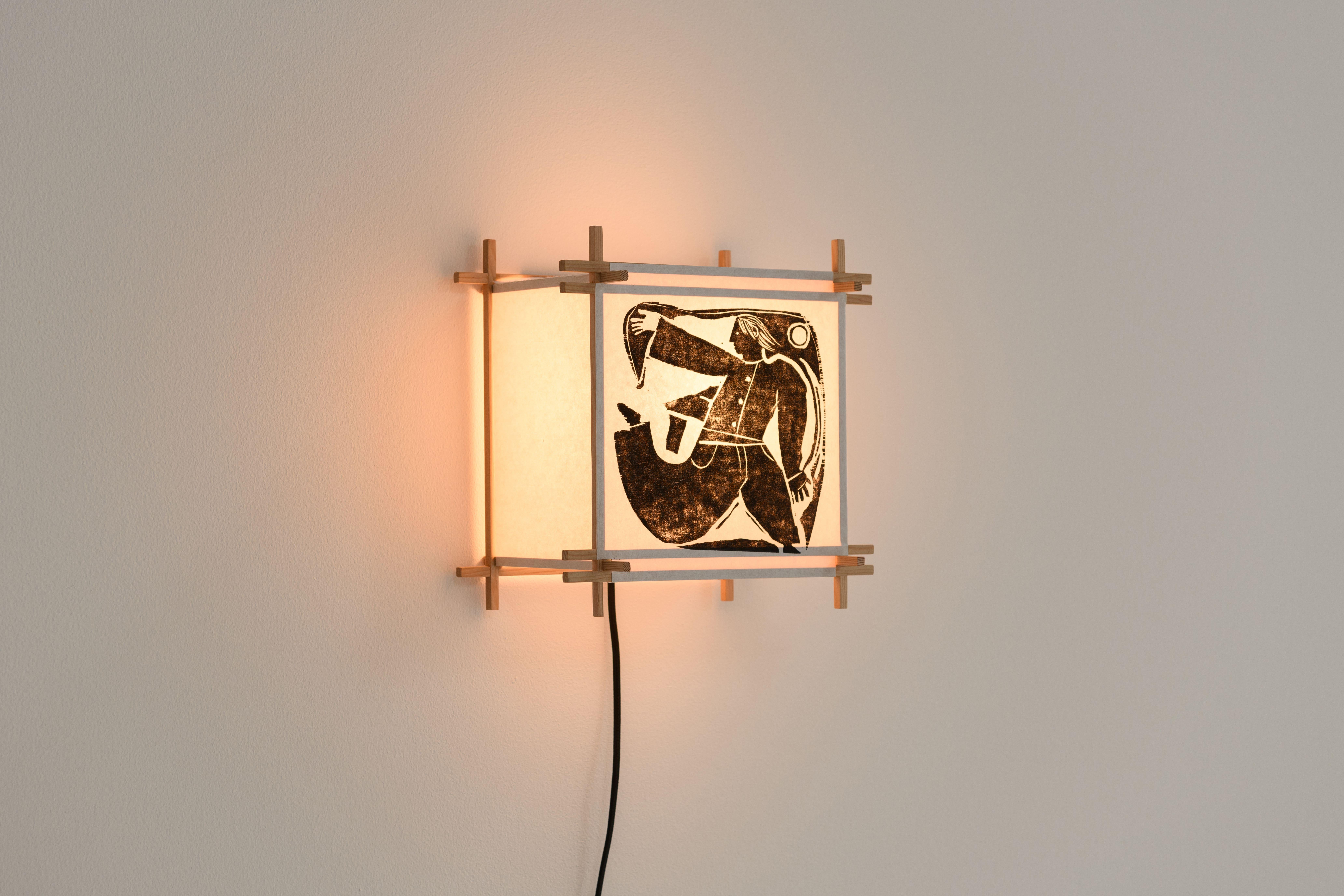 John Gnorski Kozo Paper limited edition lanterns are being sold exclusively through Studio AHEAD.

‍These lights are made of Douglas fir, Thai kozo paper, and porcelain electrical elements, and hand printed with one of three woodblock images carved