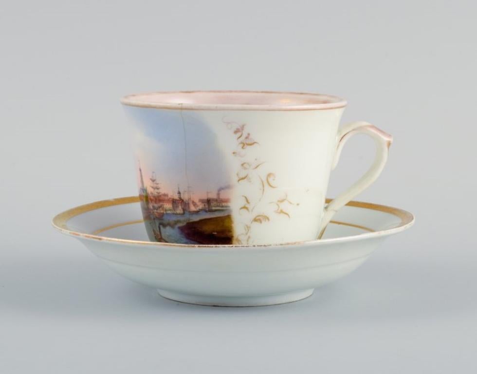 KPM, Berlin. Antique cup in overglaze, hand painted with city motif from Leere in Germany.
Mid-19th century.
With wear to gold leaf, a hairline crack on the cup and a hairline crack on the handle.
Meissen saucer included.
Cup: H 7.0 x D 9.0 cm.