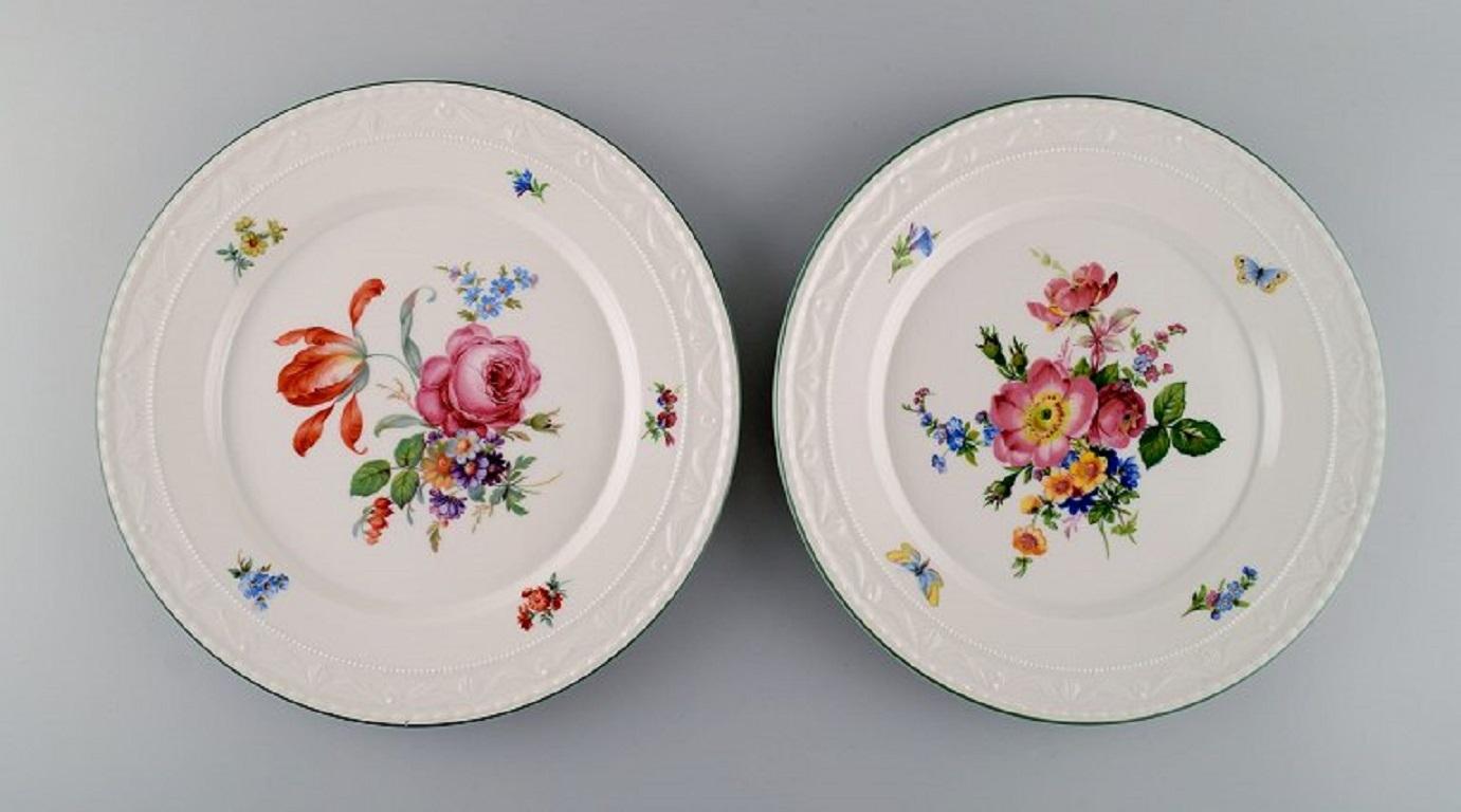 KPM, Berlin. Five antique porcelain plates with hand-painted flowers and butterflies. Early 20th century.
Diameter: 25.5 cm.
In excellent condition.
Stamped.