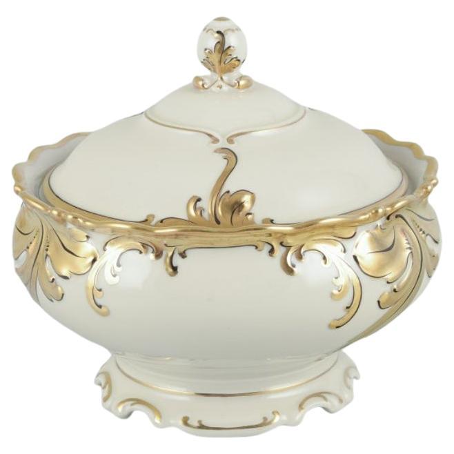 KPM Berlin, “Friederike” lidded bowl in cream porcelain with gold decoration