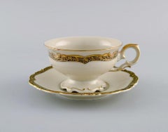 KPM, Berlin, Seven Royal Ivory Tea Cups with Saucers in Cream-Colored Porcelain