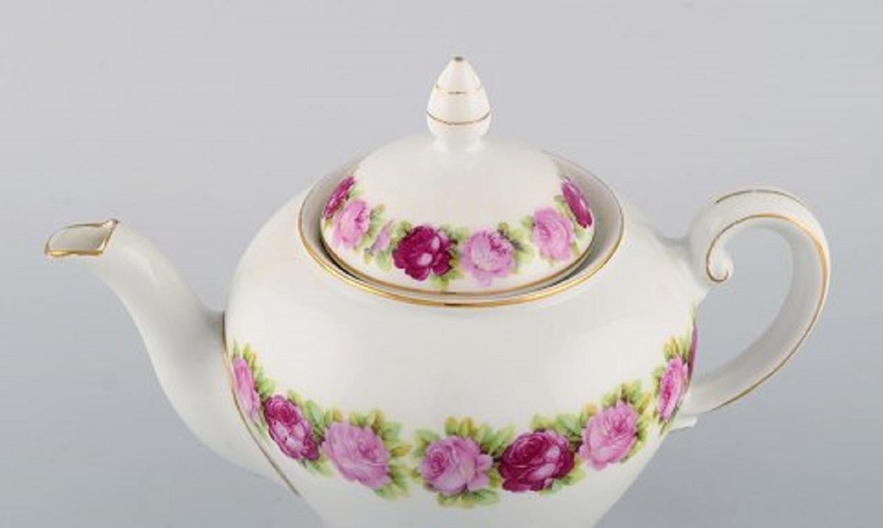 German KPM, Berlin, Tea Service for 12 People in Hand Painted Porcelain with Flowers For Sale
