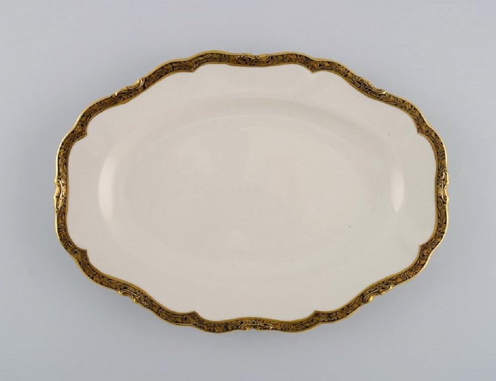 KPM, Berlin. 
Three Royal Ivory serving dishes in cream-colored porcelain with gold decoration. 1920s.
Largest measures: 38 x 26 cm.
Smallest measures: 24 x 17 cm.
In excellent condition.
Stamped.