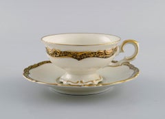 KPM, Berlin, Twelve Royal Ivory Tea Cups with Saucers in Cream-Colored Porcelain