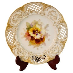 Antique KPM Cabinet Plate with Intricate Reticulation and a Central Painting of Pansies