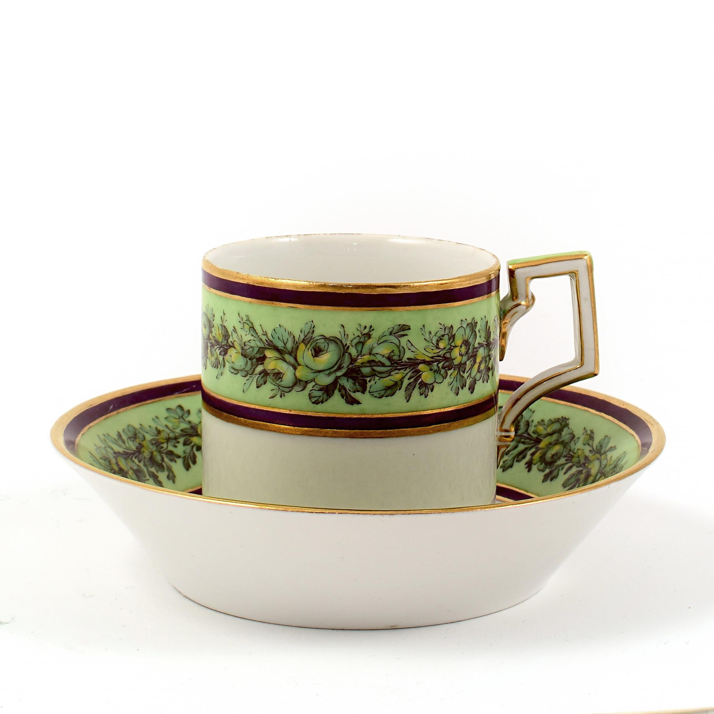 German KPM Empire Porcelain Cup and Saucer Decorated with a Green Flower Border