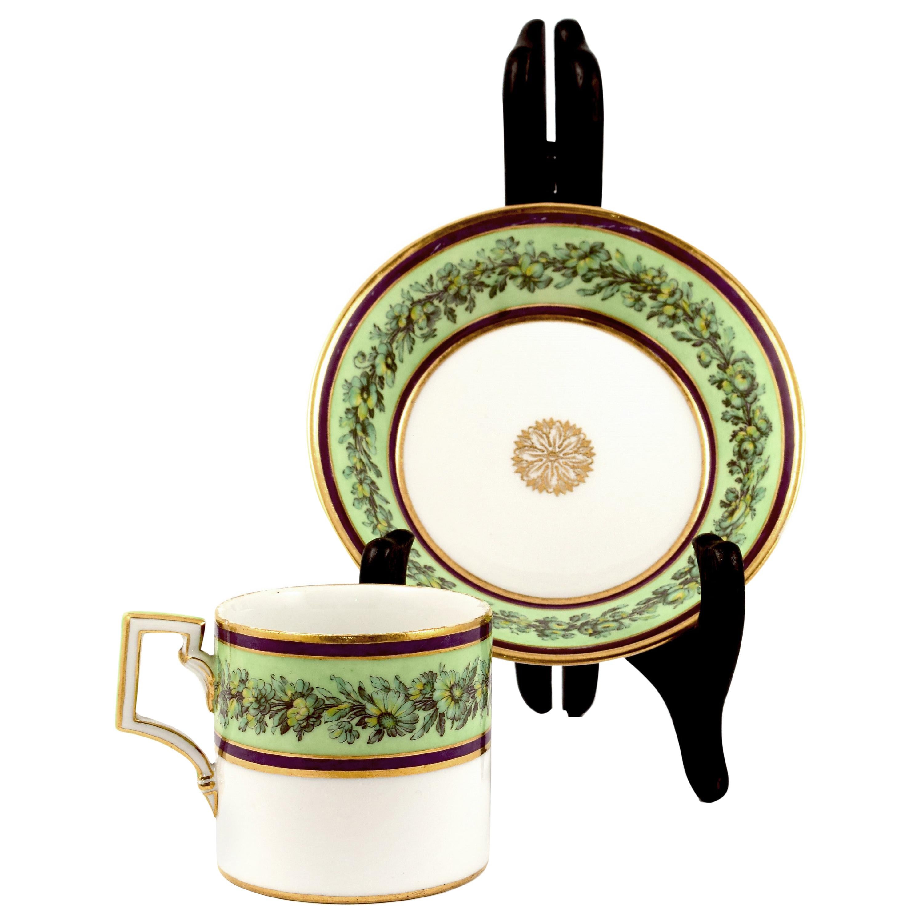 KPM Empire Porcelain Cup and Saucer Decorated with a Green Flower Border