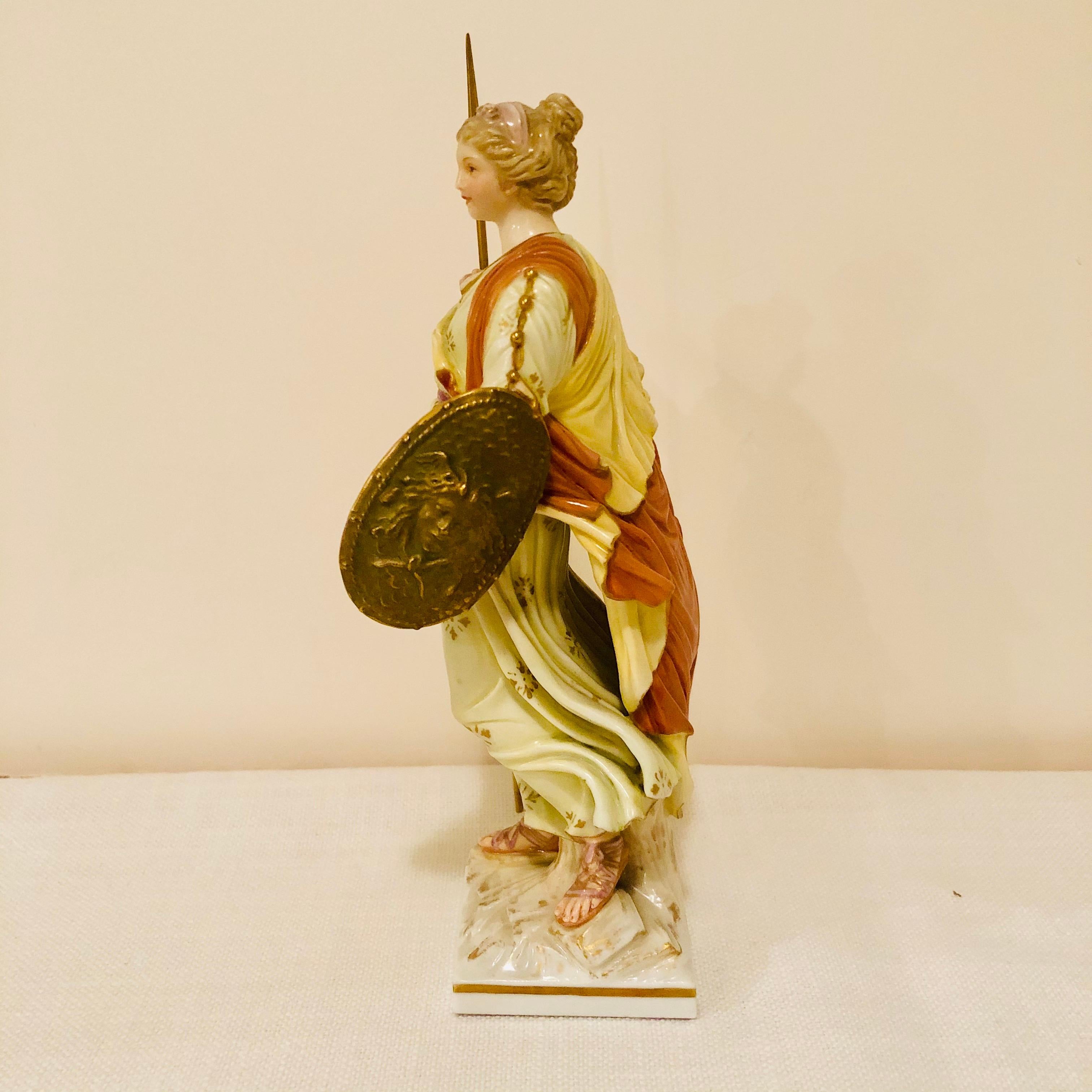 I would like to offer you this amazing KPM porcelain figurine of a lady warrior with her shield and spear. I believe she is Athena. As you can see in the pictures, her shield has a raised face with wings on the head of the face. I think this shield