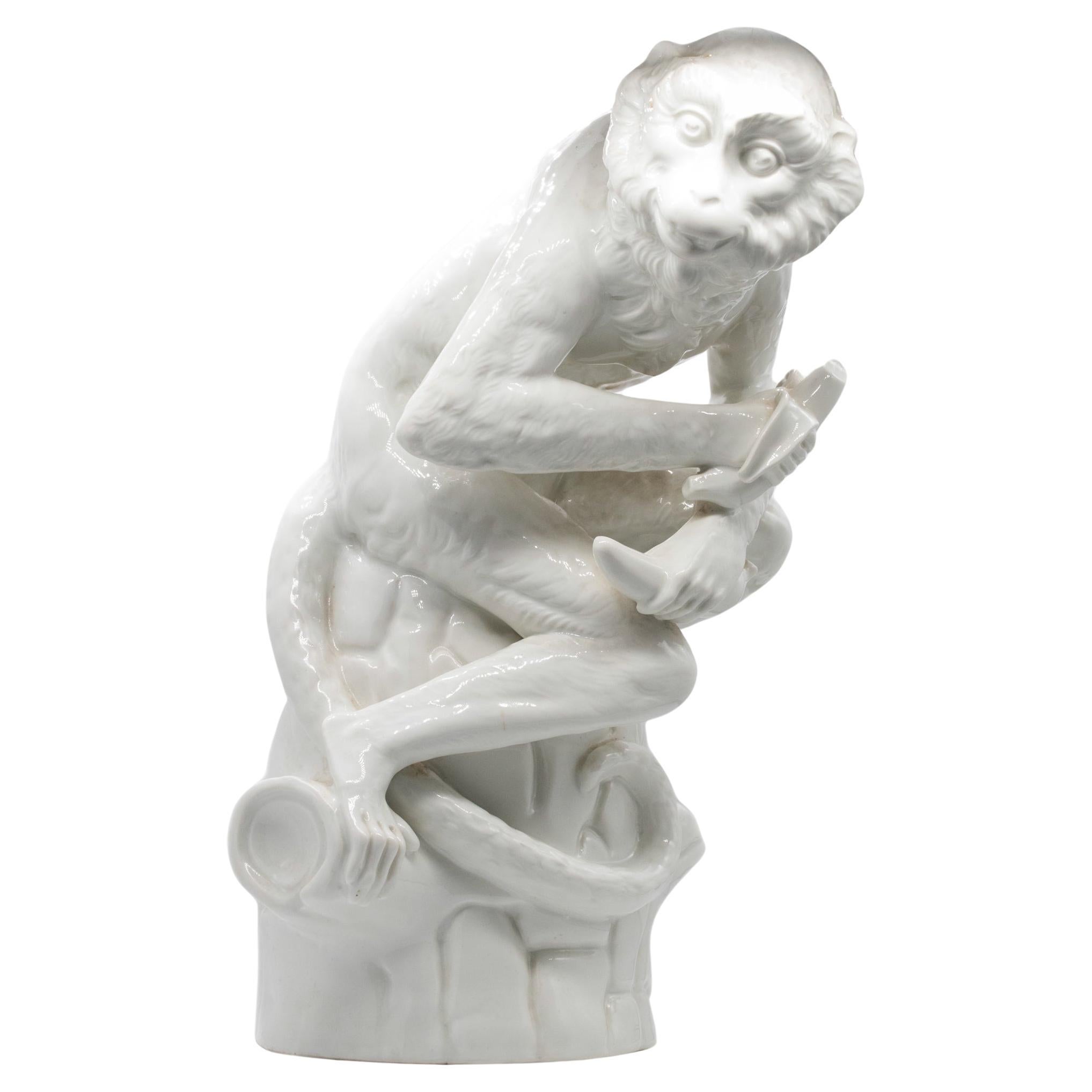 KPM Germany 1950 Seated Monkey Eating A Banana Figure In White Glazed Porcelain For Sale