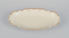 KPM, Poland. Three oblong porcelain platters.