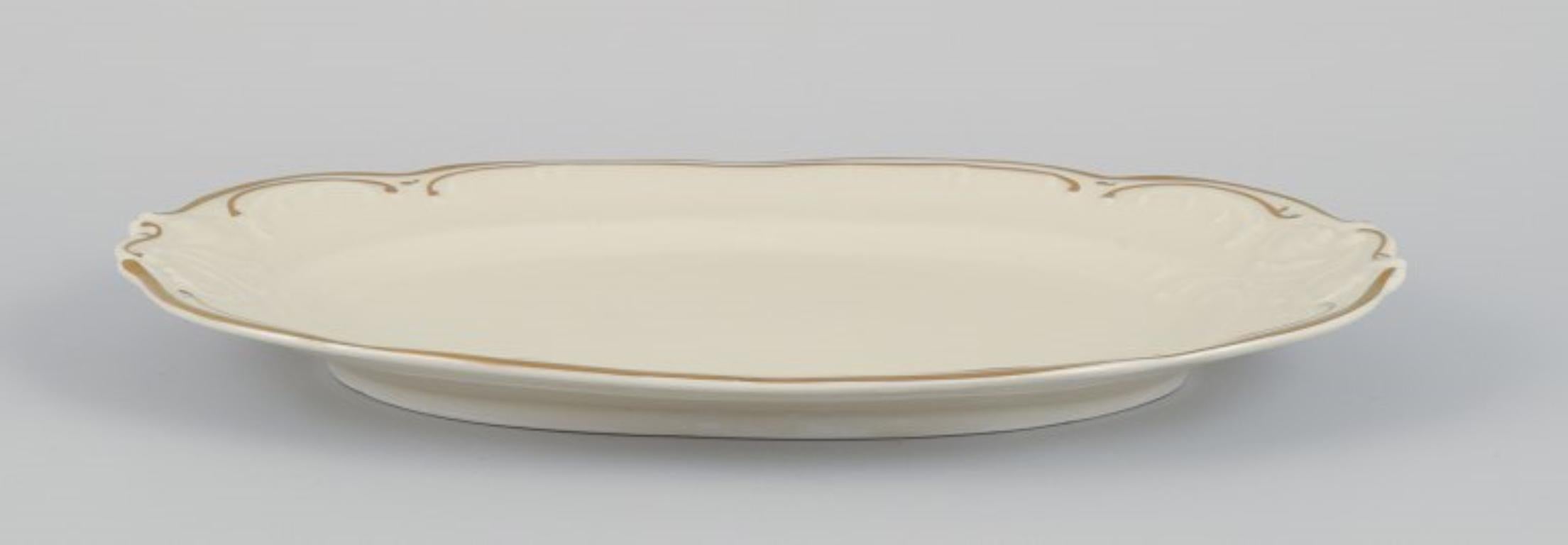 Mid-20th Century KPM, Poland. Three oblong porcelain platters.  For Sale