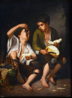 KPM porcelain plaque of young boys eating fruit, circa 1880