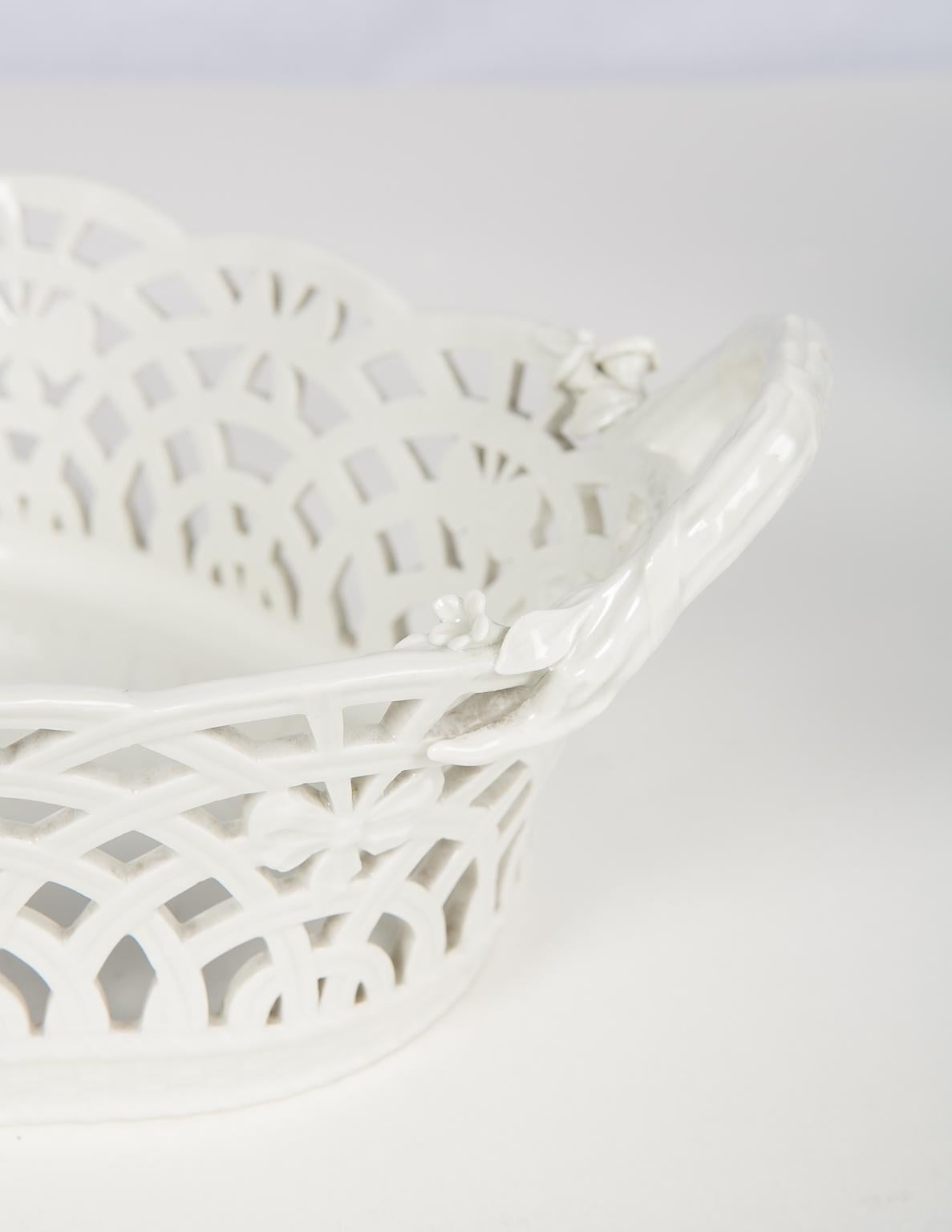 A beautiful KPM antique pierced porcelain basket made by the Royal Porcelain Factory in Berlin
in the late 19th century.
This beautiful basket is both decorative and useful. It is a wonderful size. It can go in the centre of a table with flowers.