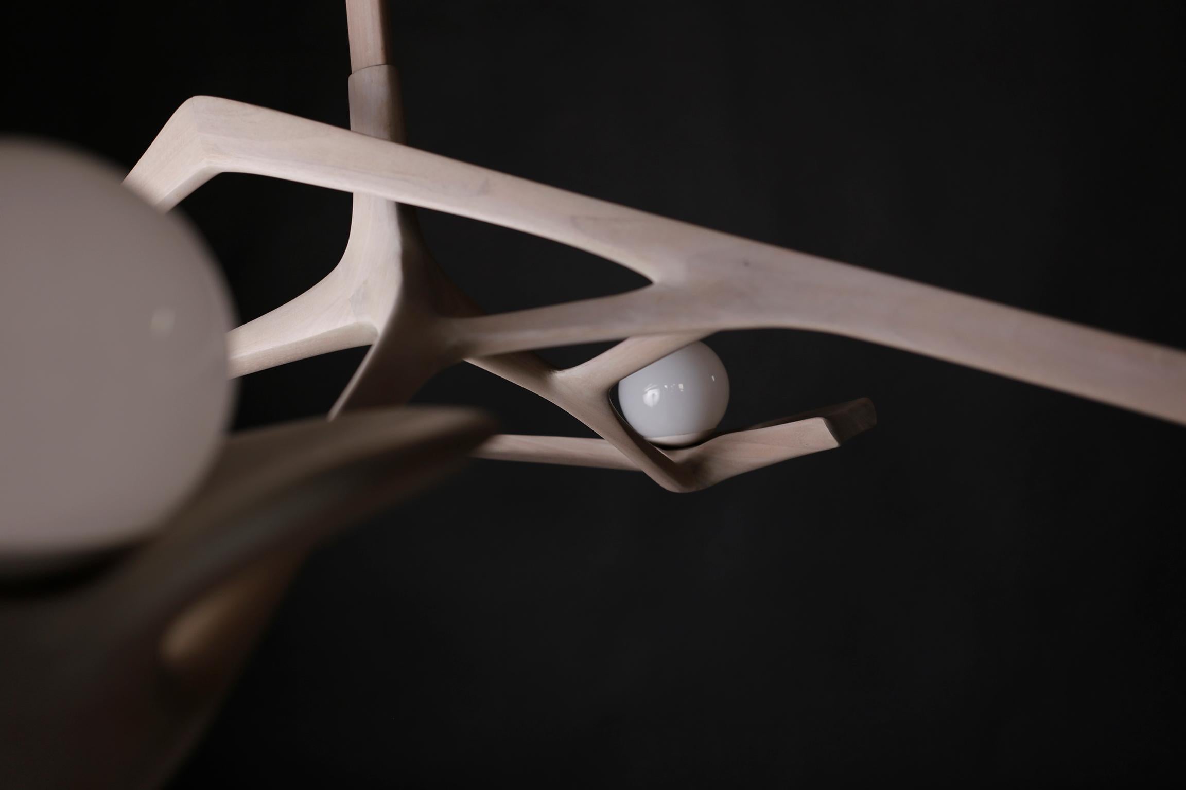 Please note that the Pearl Chandelier's dimensions do not include the ceiling suspension arm length. There is three sizes for the Pearl Chandelier, with this listing being for the Mini size.  Please inquire for more details on fixture dimensions