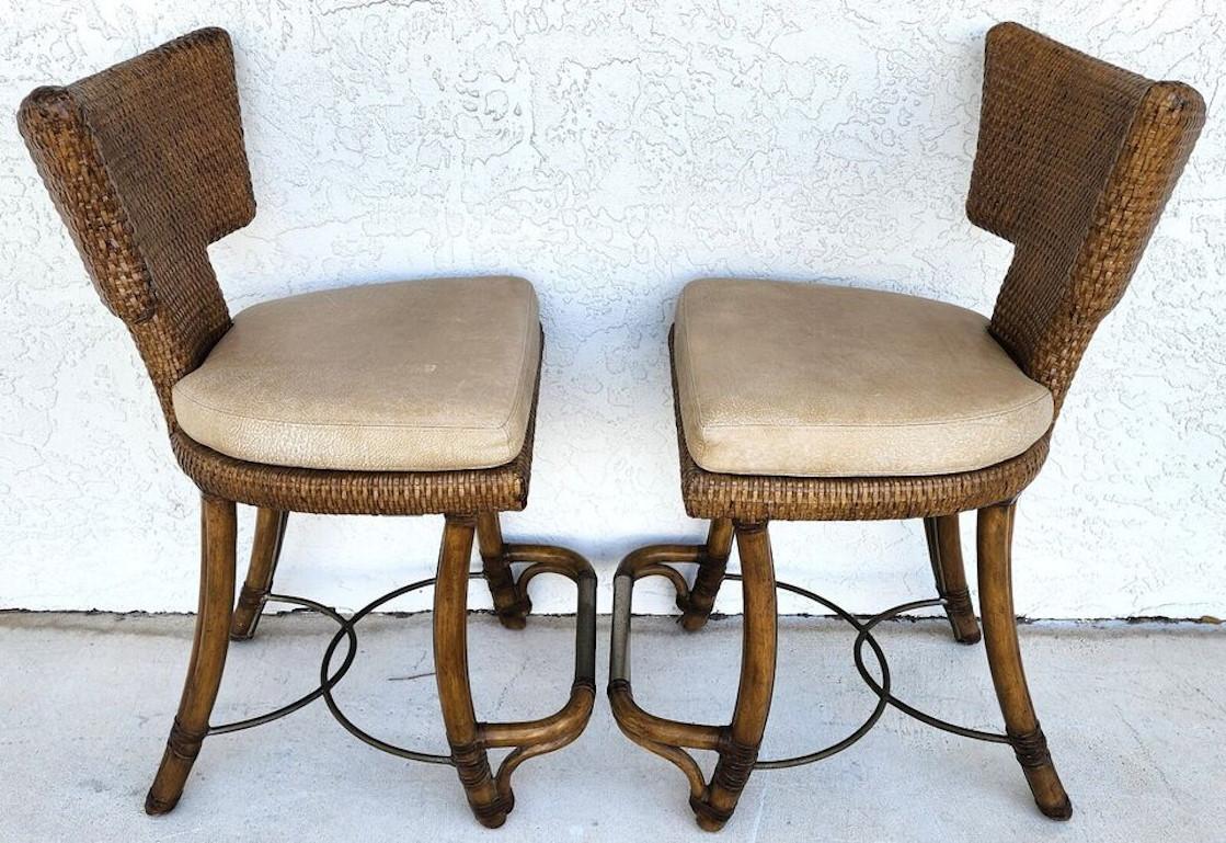 For FULL item description click on CONTINUE READING at the bottom of this page.

Offering One Of Our Recent Palm Beach Estate Fine Furniture Acquisitions Of A
Pair of Vintage Kreiss Bamboo Counter Stools with Leather Straped Backs, Top Grain Leather