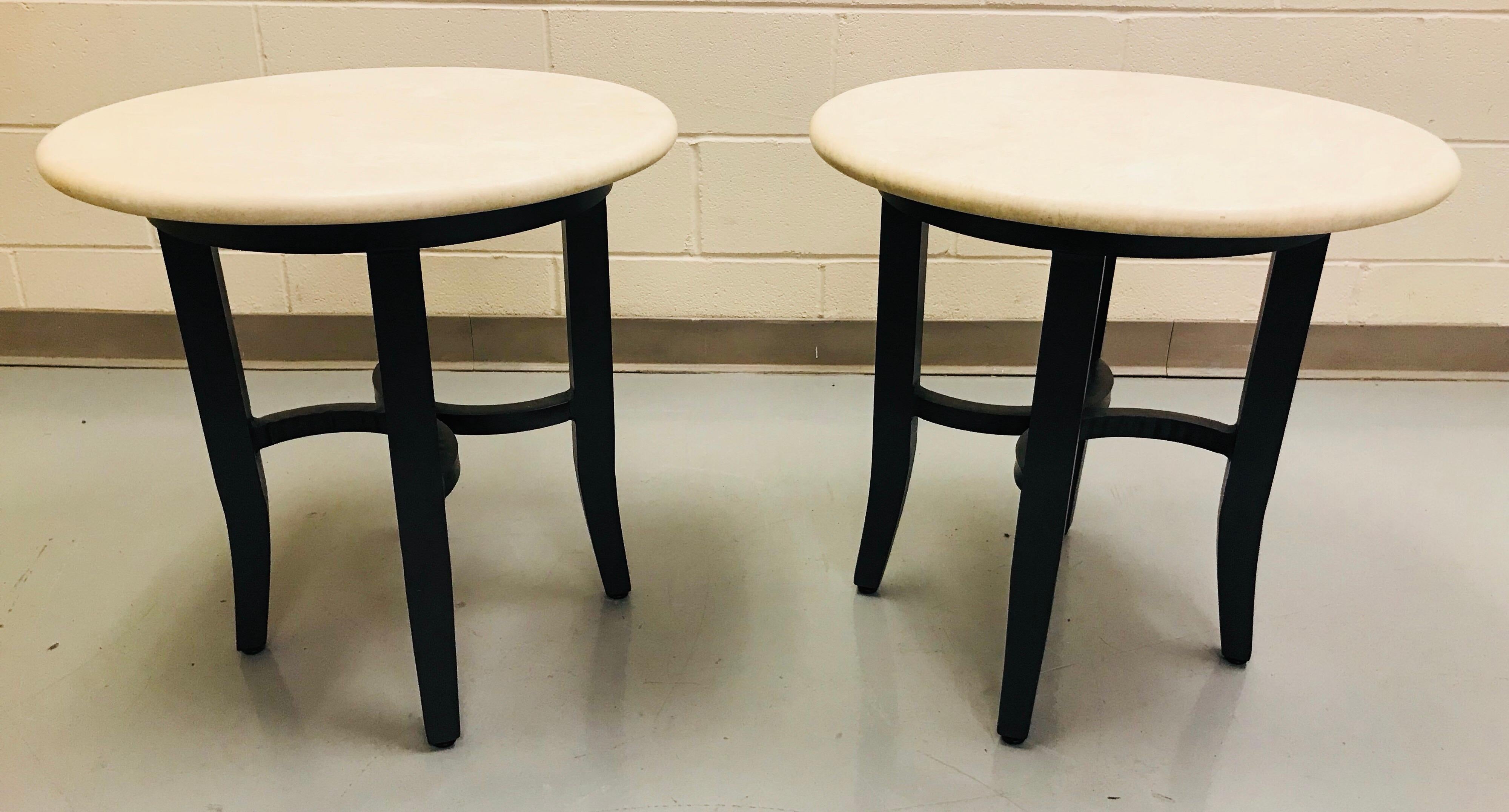 Kreiss collection pair of end tables with a powder coated aluminum base and travertine top. They are for outdoor use but are also suitable for indoor use as well. This pair was never outdoors and were used for the interior of an estate.
