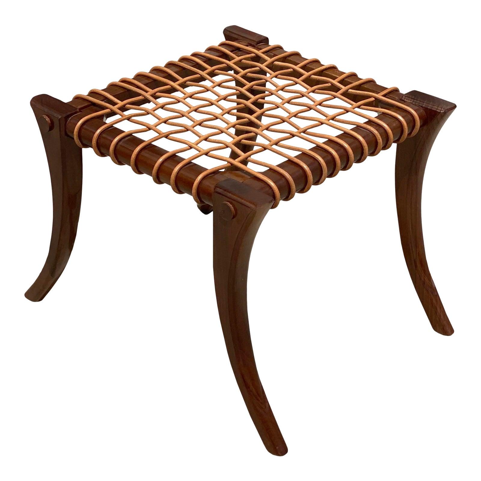 A beautiful, in-near perfect condition Kreiss Klismos woven wood ottoman or stool. Gorgeous and stunning piece. Unmarked.