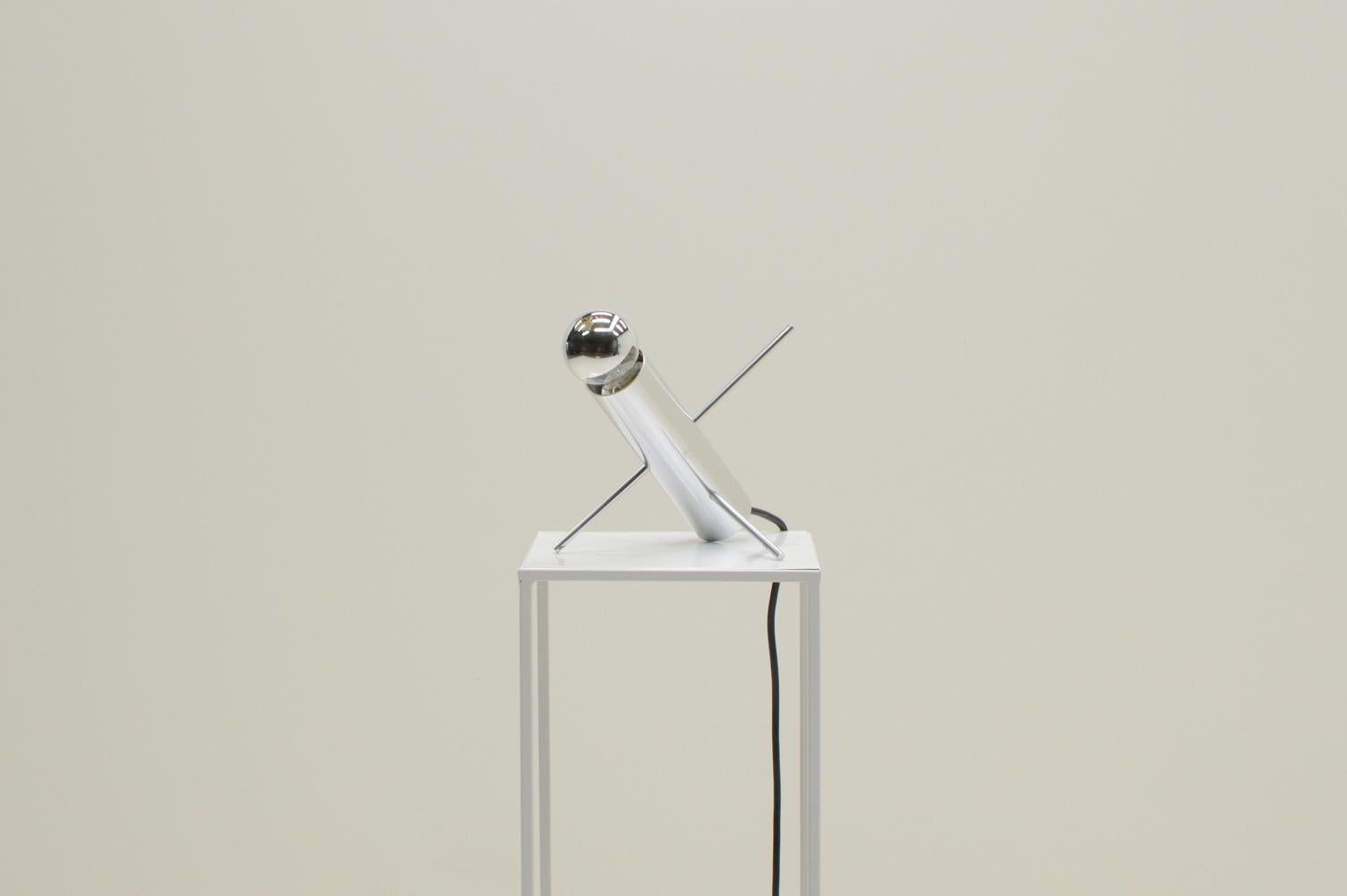 “Krekel” table lamp by Otto Wasch for Raak Amsterdam, 190s The Netherlands. “krekel” is Dutch for Cricket, but the lamp is also known as Model R-60. Minimalistic design and made from bruched aluminum. By moving the pins you can change the position