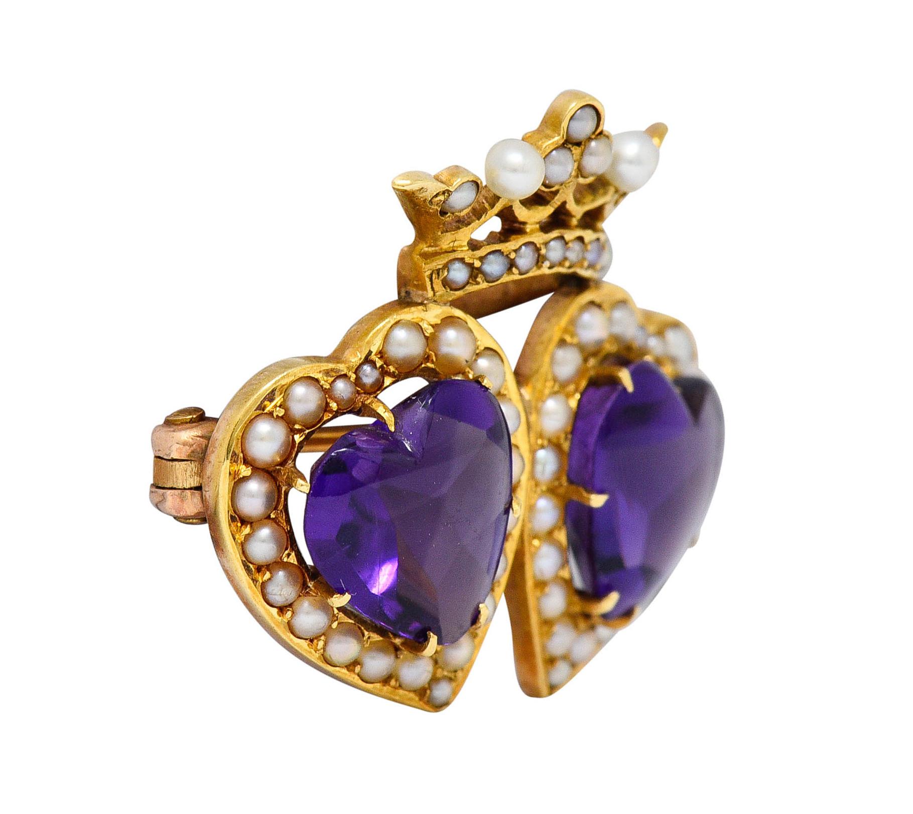 Petite brooch is designed as two hearts topped by a crown

Featuring two amethyst heart cabochons, richly purple, and measuring approximately 8.2 x 8.5 mm

Accented throughout by freshwater natural pearls - well matched with good luster

Completed