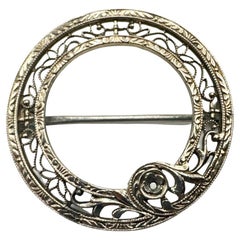 Broche Art Déco Antiguo Krementz en oro de 14 quilates y platino