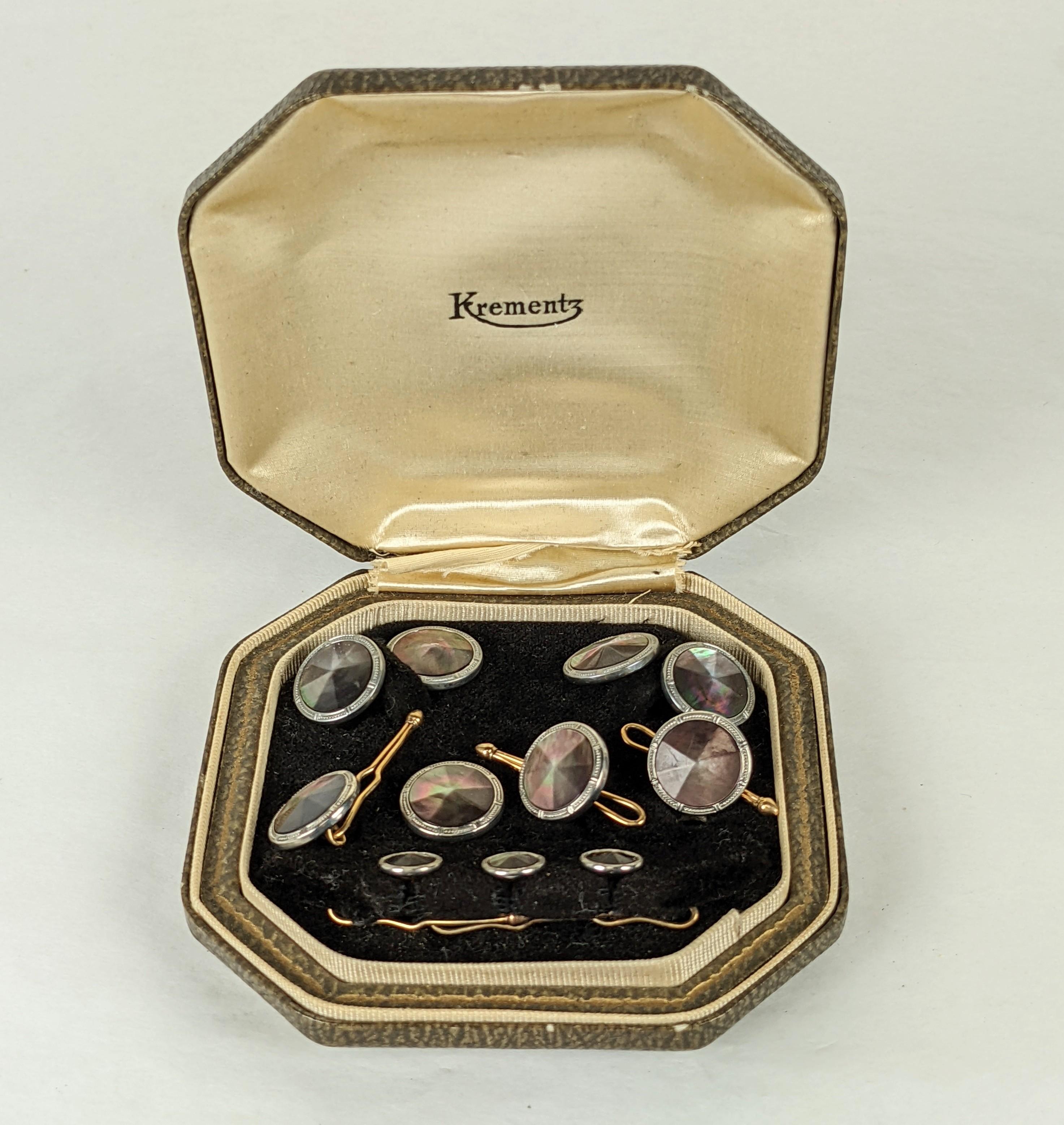 Krementz Art Deco Mother of Pearl Stud Set for use with tuxedo or dress shirt. Unusual grey mother of pearl is faceted in a radiating pattern set in chrome metal with gold filled backings. Set includes pair of cufflinks (5/8