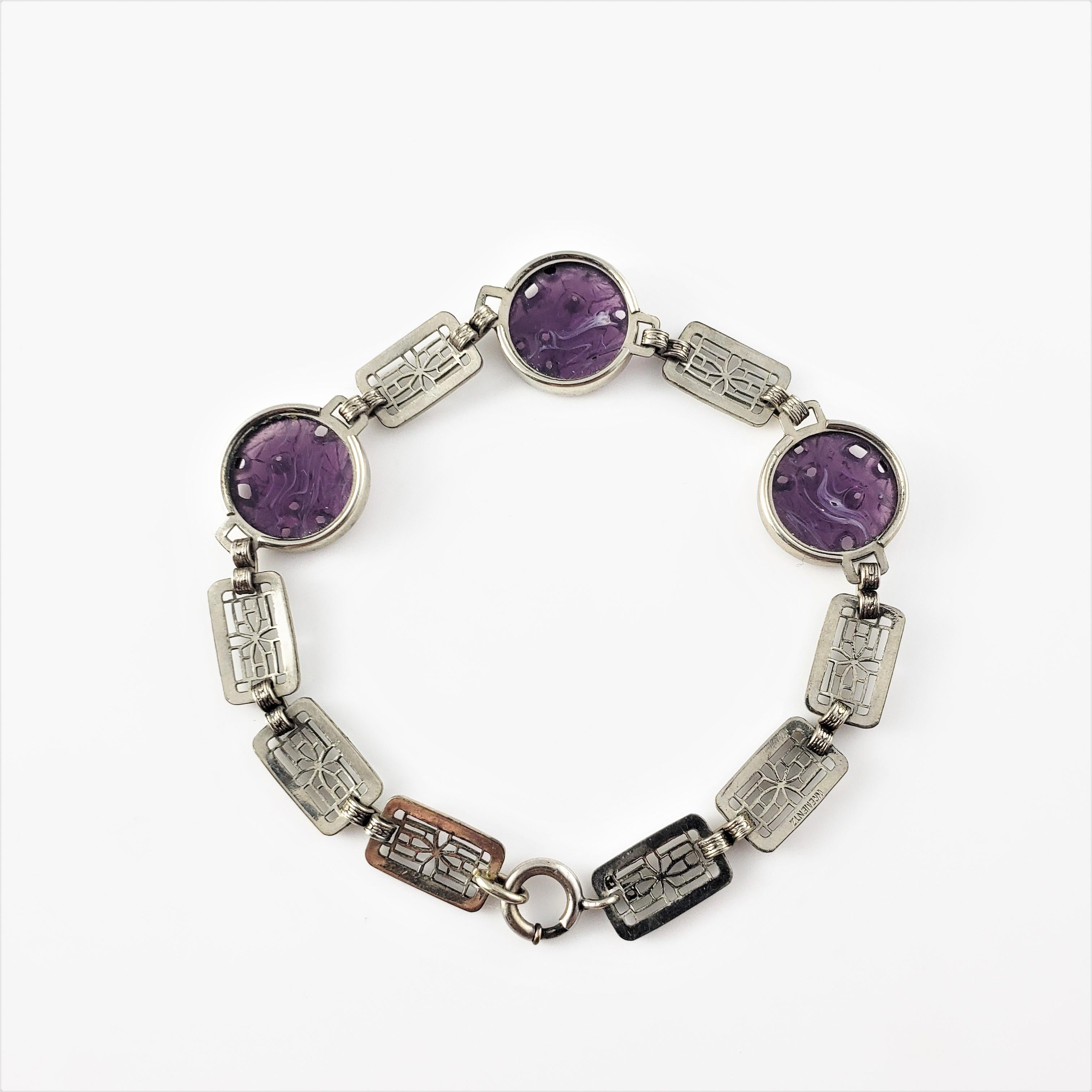 Vintage Krementz Art Deco Sterling Silver Purple Carved Peking Glass Filigree Bracelet-

This lovely bracelet features carved Peking glass set in beautifully detailed sterling silver. Width: 1/2 