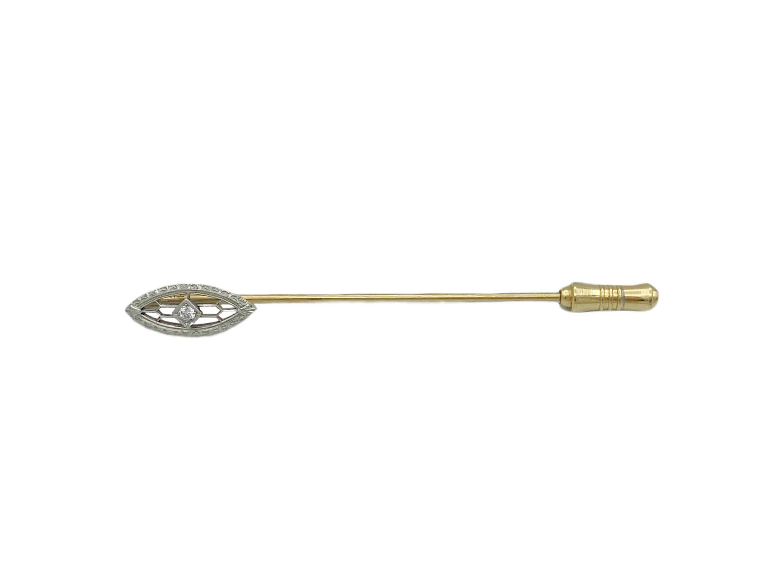 Lovely, elegant antique Krementz solid 14K yellow gold, platinum-topped Art Deco stick pin circa the 1920s. The pin face is formed in a pointed oval shape with fine etched detailing, milgrain and openwork framing a 2.4mm Old European cut diamond.