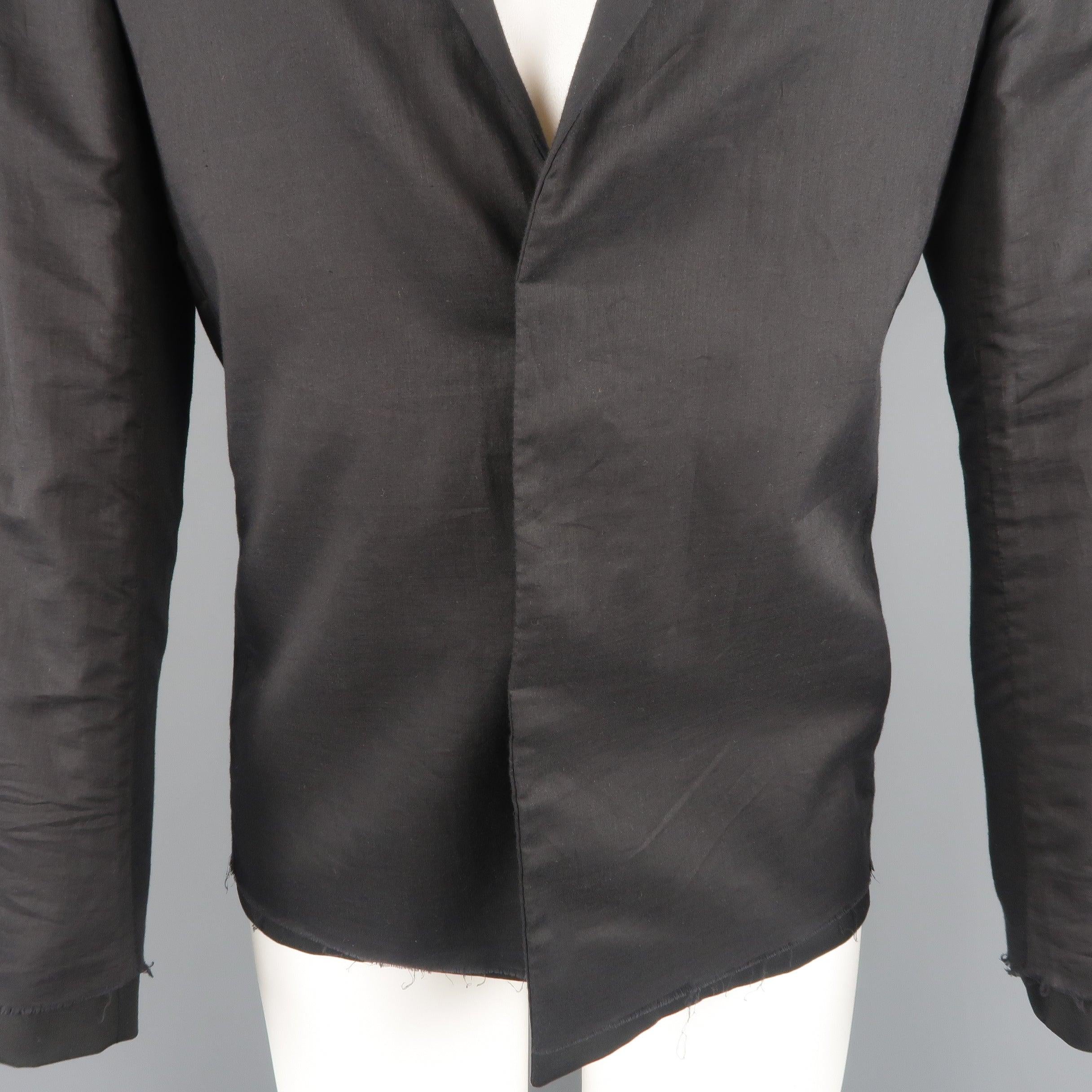 KRIS VAN ASSCHE sport coat comes in black wool with a raw frayed edge gauze overlay, two button front, and notch lapel. Made in Italy.
New with Tags.
 

Marked:   IT 46
 

Measurements: 
  
l	Shoulder: 17 inches 
l	Chest: 40 in,
l	Sleeve: 26 inches