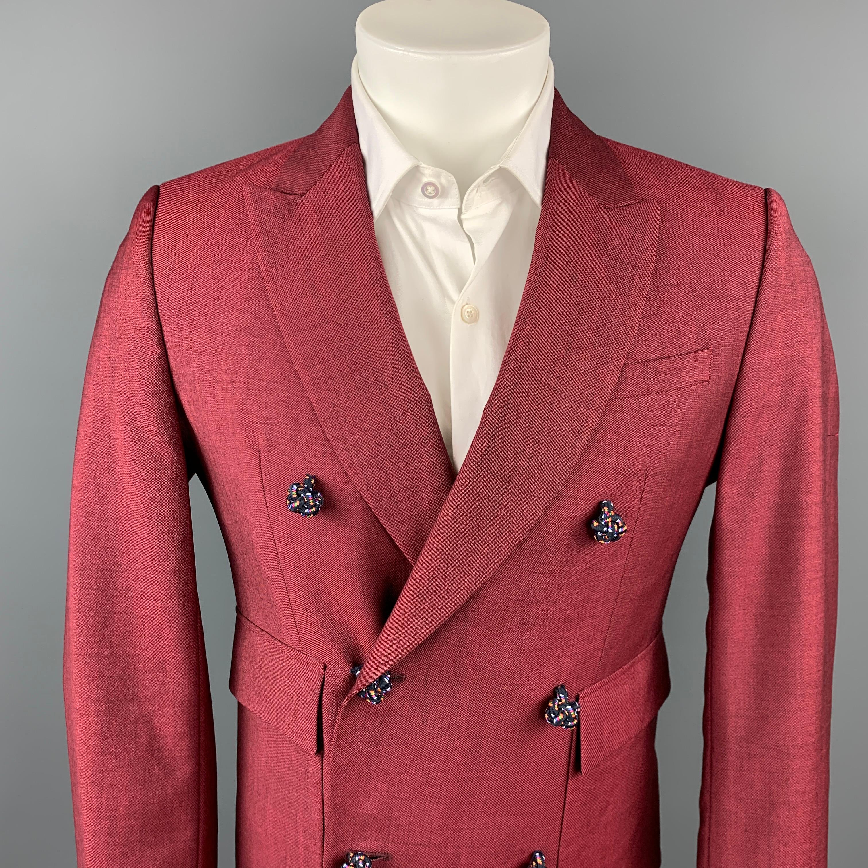KRIS VAN ASSCHE sport coat comes in a burgundy viscose blend with a full liner featuring a peak lapel, flap pockets, silk knot button details, and a double breasted closure.

Very Good Pre-Owned Condition.
Marked: 46

Measurements:

Shoulder: 17