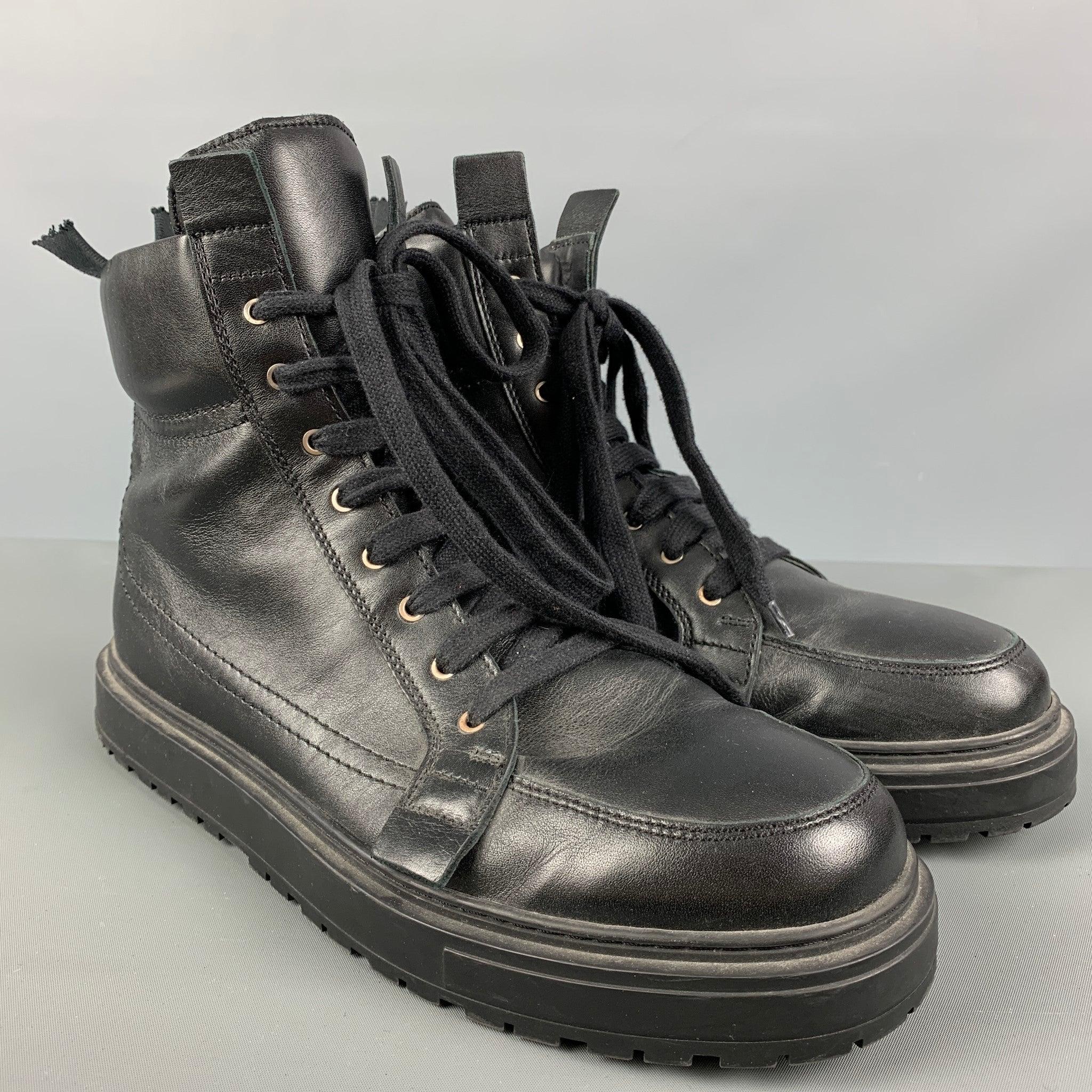 KRIS VAN ASSCHE ankle boots comes in a black solid leather featuring a leather trim details, lace up, a back zipper, and thick sole.
Good Pre-Owned Condition. Broken Zipper. As-is.
 

Marked:   42 

Measurements: 
  Length: 12 inches  Width: 4.5
