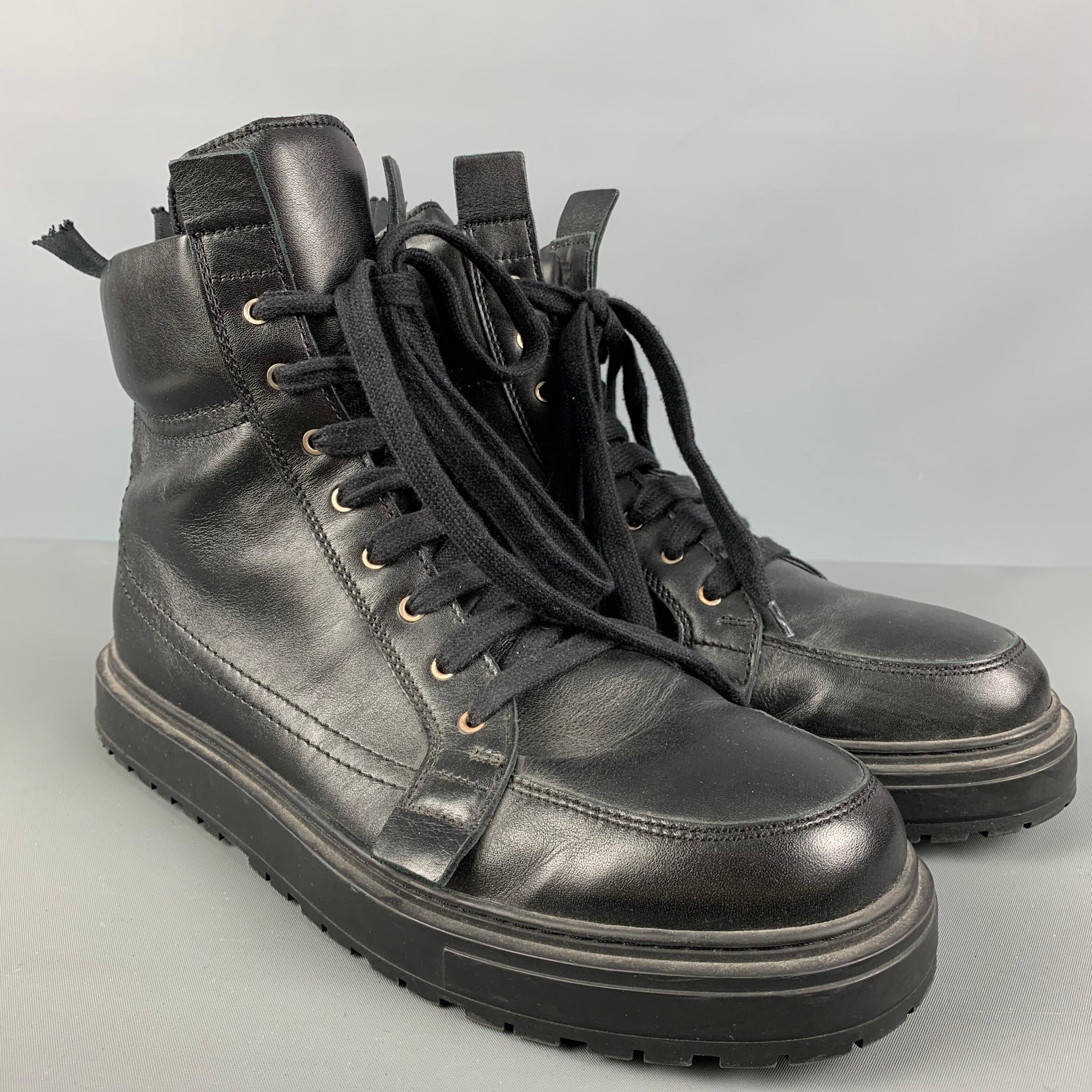 KRIS VAN ASSCHE ankle boots comes in a black solid leather featuring a leather trim details, lace up, a back zipper, and thick sole.
 
Good Pre-Owned Condition. Broken Zipper. As-is. 
Marked: 42

Measurements:

Length: 12 in.
Width: 4.5 in.
Height: