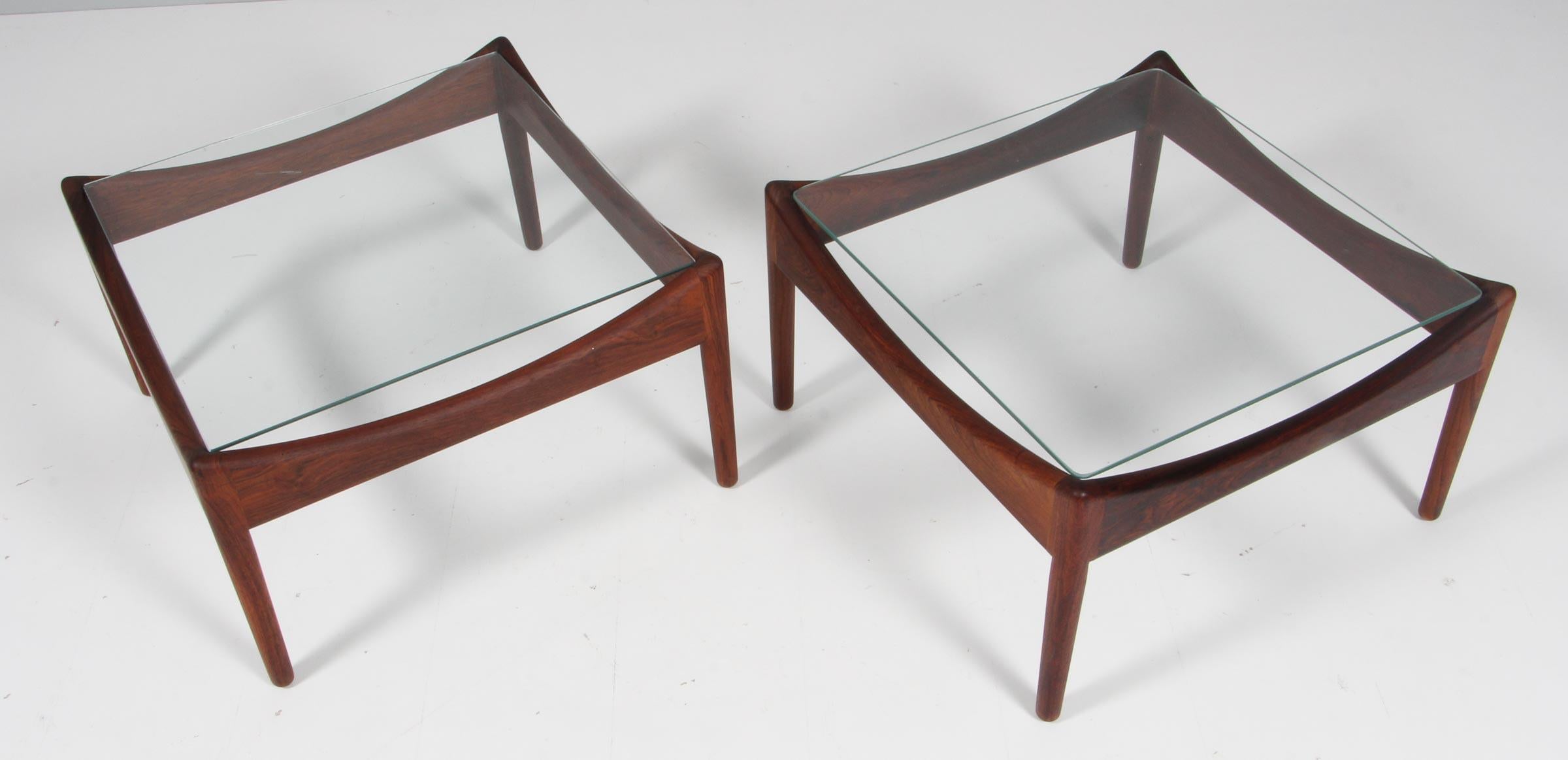 Kristian S. Vedel coffee tables, with tabloe top of glass.

Frame of solid rosewood.

Made by Søren Willadsen.