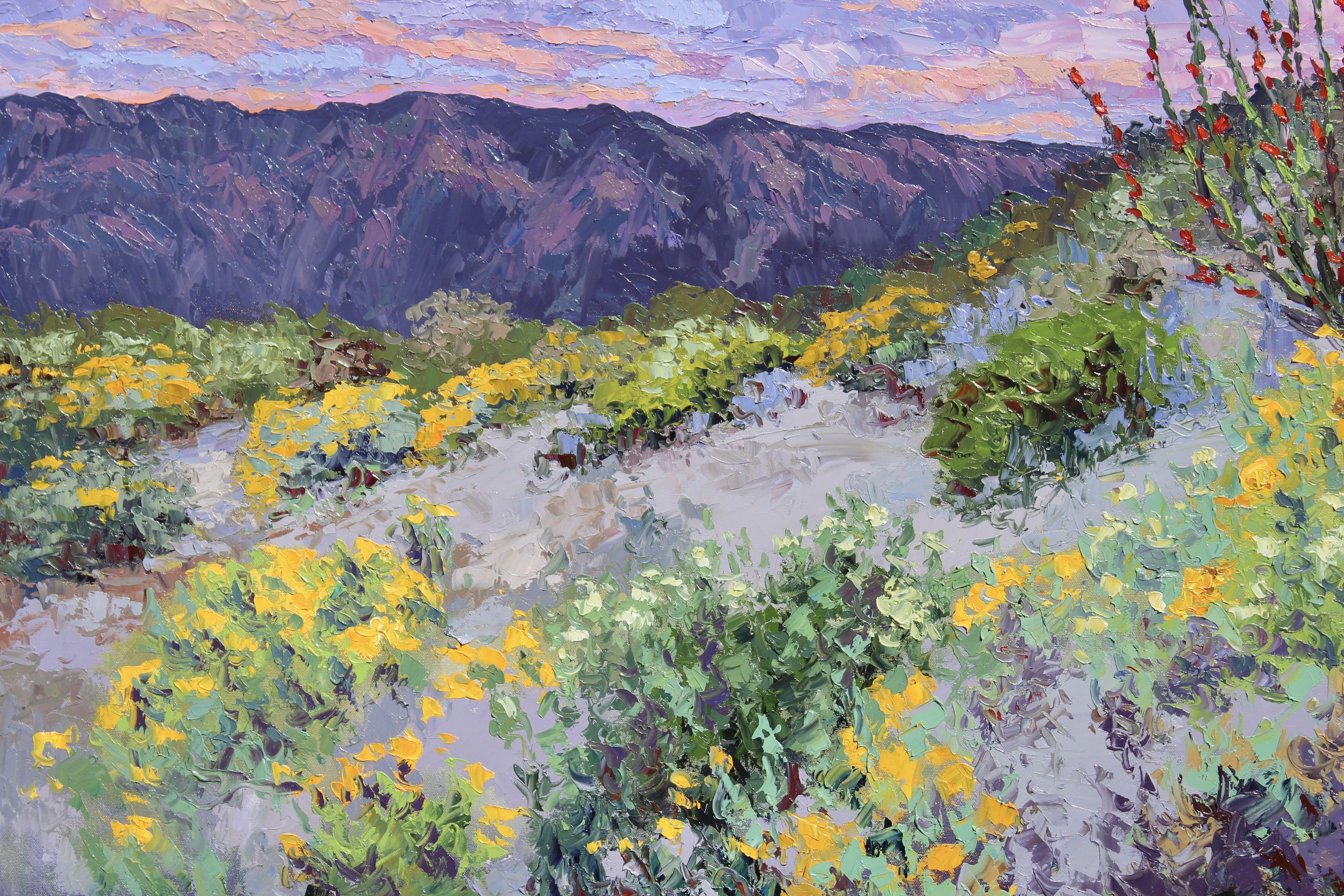 An original oil painting of the Southern California Desert featuring a glowing desert evening sky, mountains and lovely wildflowers and a barefoot ocotillo.    This painting comes with a certificate of authenticity and has been painted with the