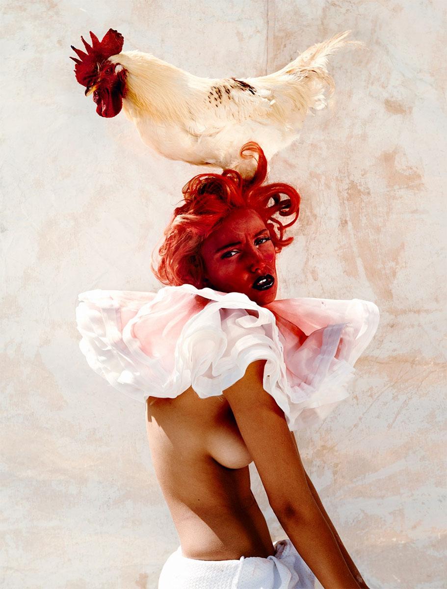 Portrait with red Bodypaint and Chicken, photographed by Kristian Schuller. 

All prints are limited edition. Available in multiple sizes. High-end framing on request.

All prints are done and signed by the artist. The collector receives an
