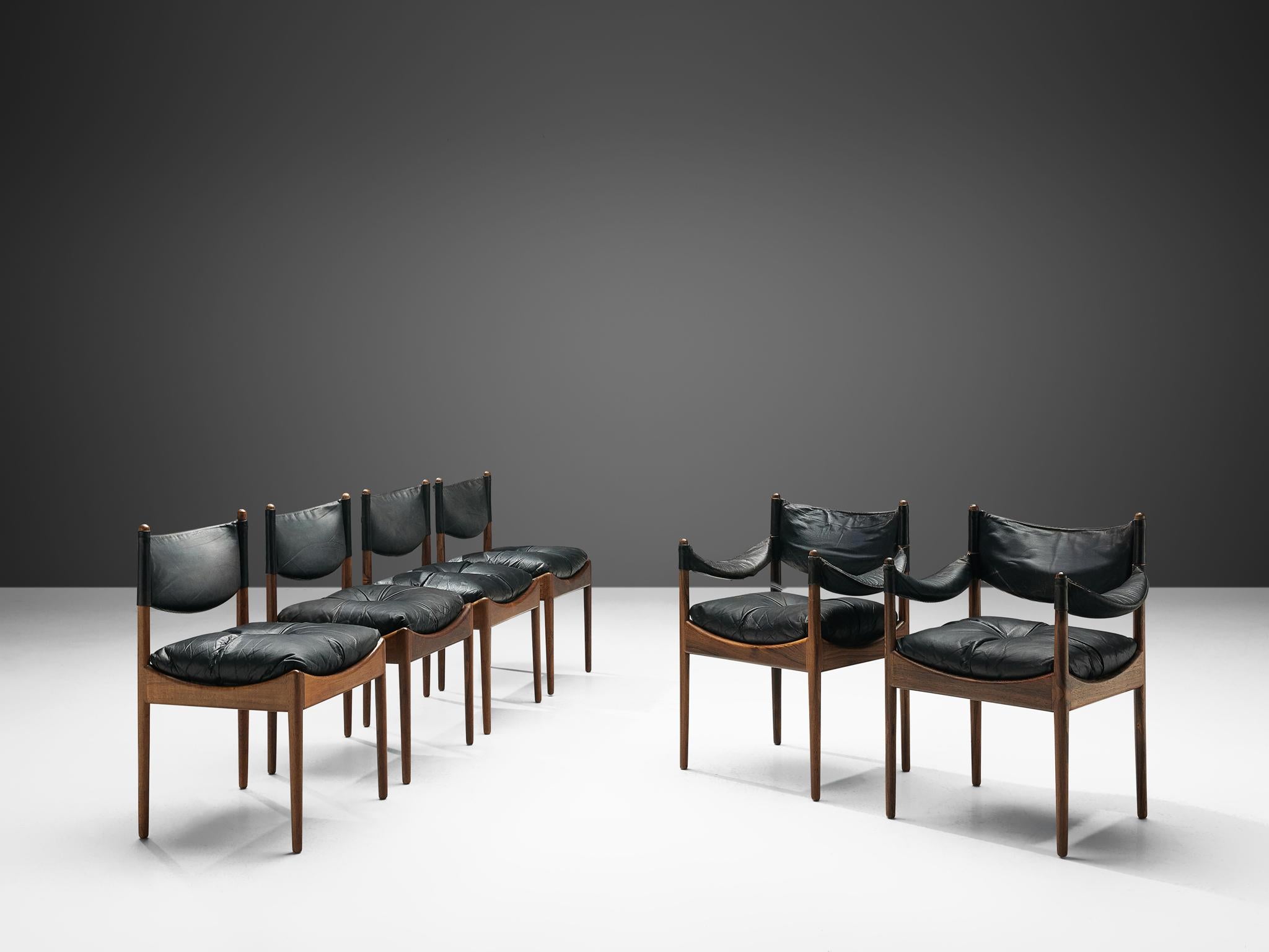 Kristian Solmer Vedel for Søren Willadsen, set of six dining chairs 'Modus', rosewood and black leather. Design 'Modus', Denmark, 1960s.

This set of chairs is designed by Danish designer Kristian Vedel in the 1960s. The chairs feature a rosewood