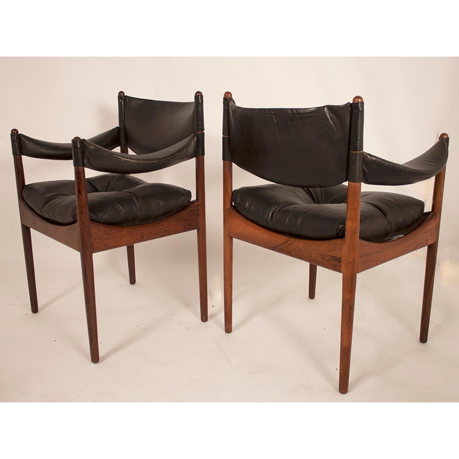 Kristian Vedel midcentury black leather Danish set four armchairs for Soren Willadsen.
The table is not available.
