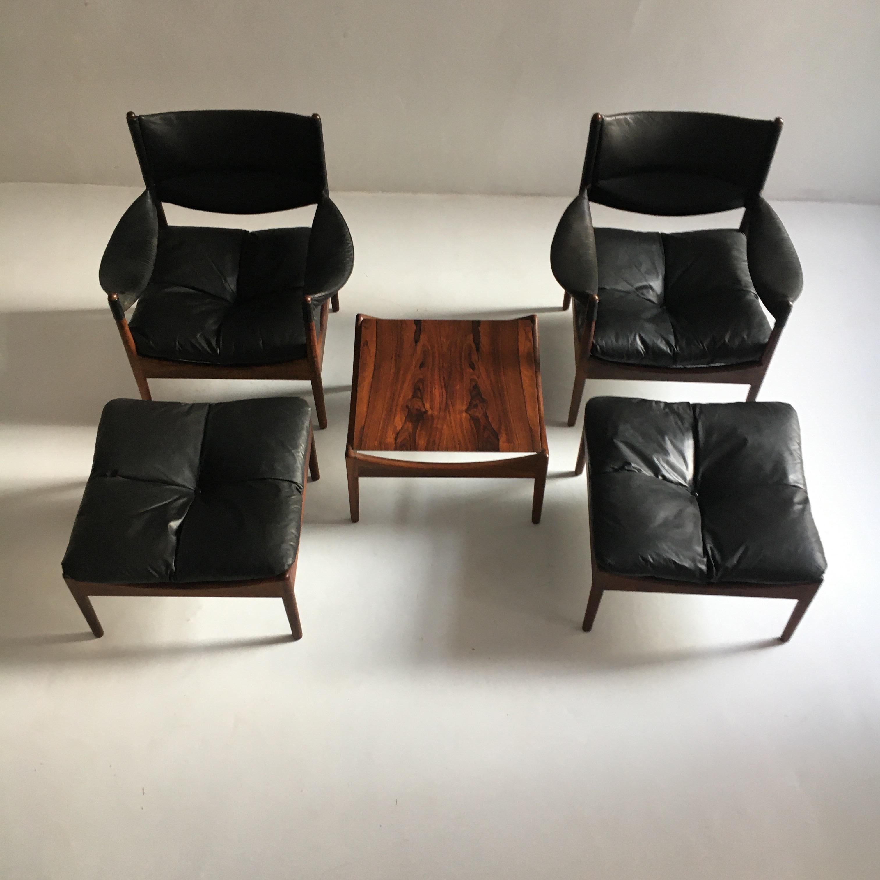 Early Version Kristian Solmer Vedel easy chairs model 'Modus' with stools and table by Søren Willadsen Møbelfabrik, Denmark, 1950.