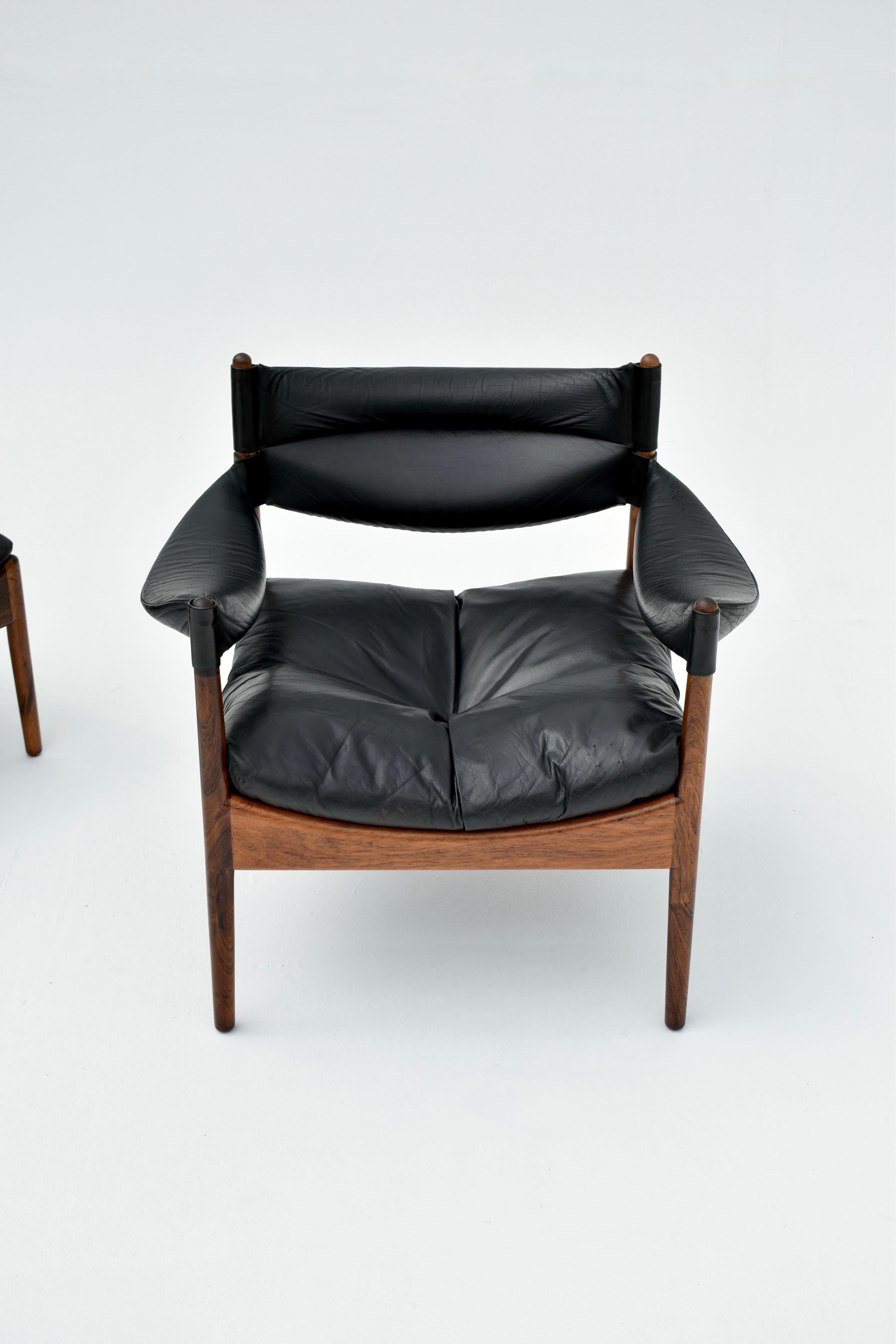A Danish design classic. kristian Solmer Vedel designed the ‘Modus’ range of furniture in 1963 for cabinetmakers Soren Willadsen.

Crafted from soild Brazilian rosewood with black leather upholstery. The design and construction is very unique with a